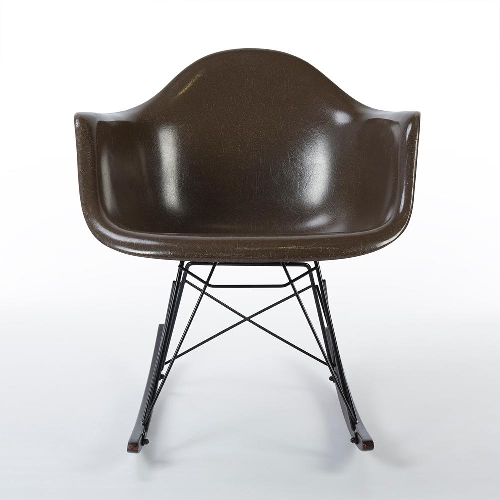 A love it or hate it colour it may be, but brown is an extremely versatile colour and this original Eames Herman Miller RAR rocking arm chair is a perfect example of this. Though a little used and displaying some signs of its age, this shell looks