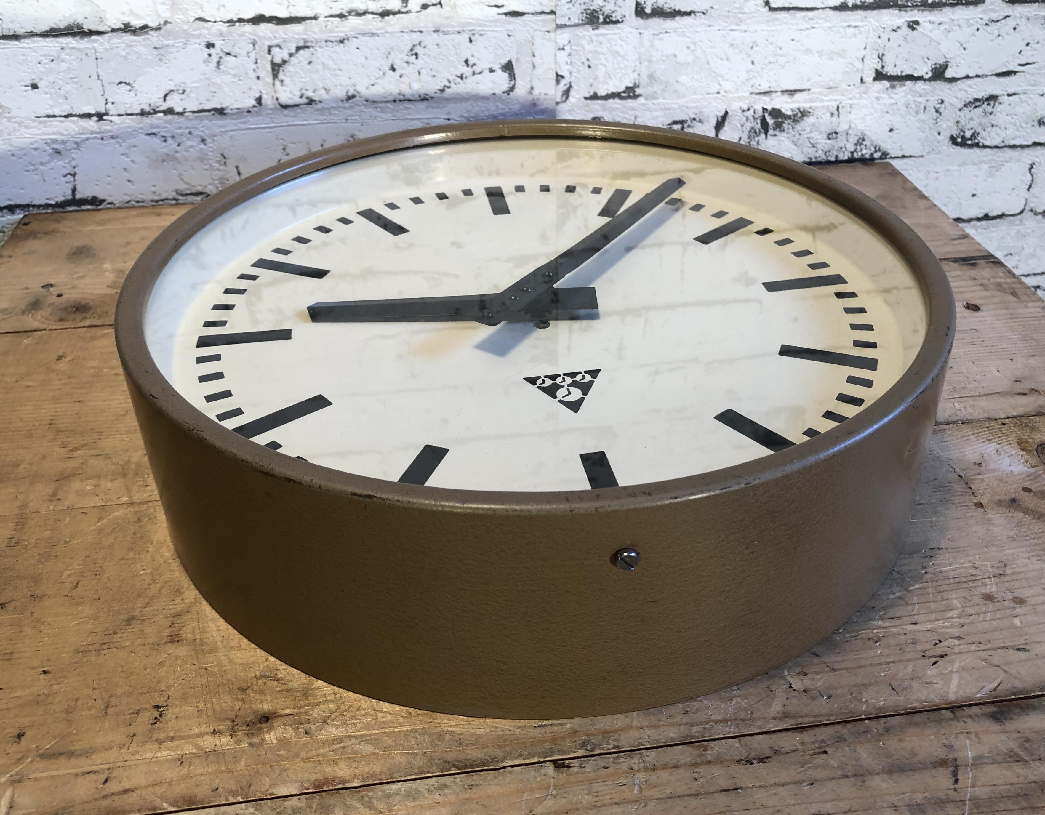 Lacquered Brown Industrial Wall Clock from Pragotron, 1960s