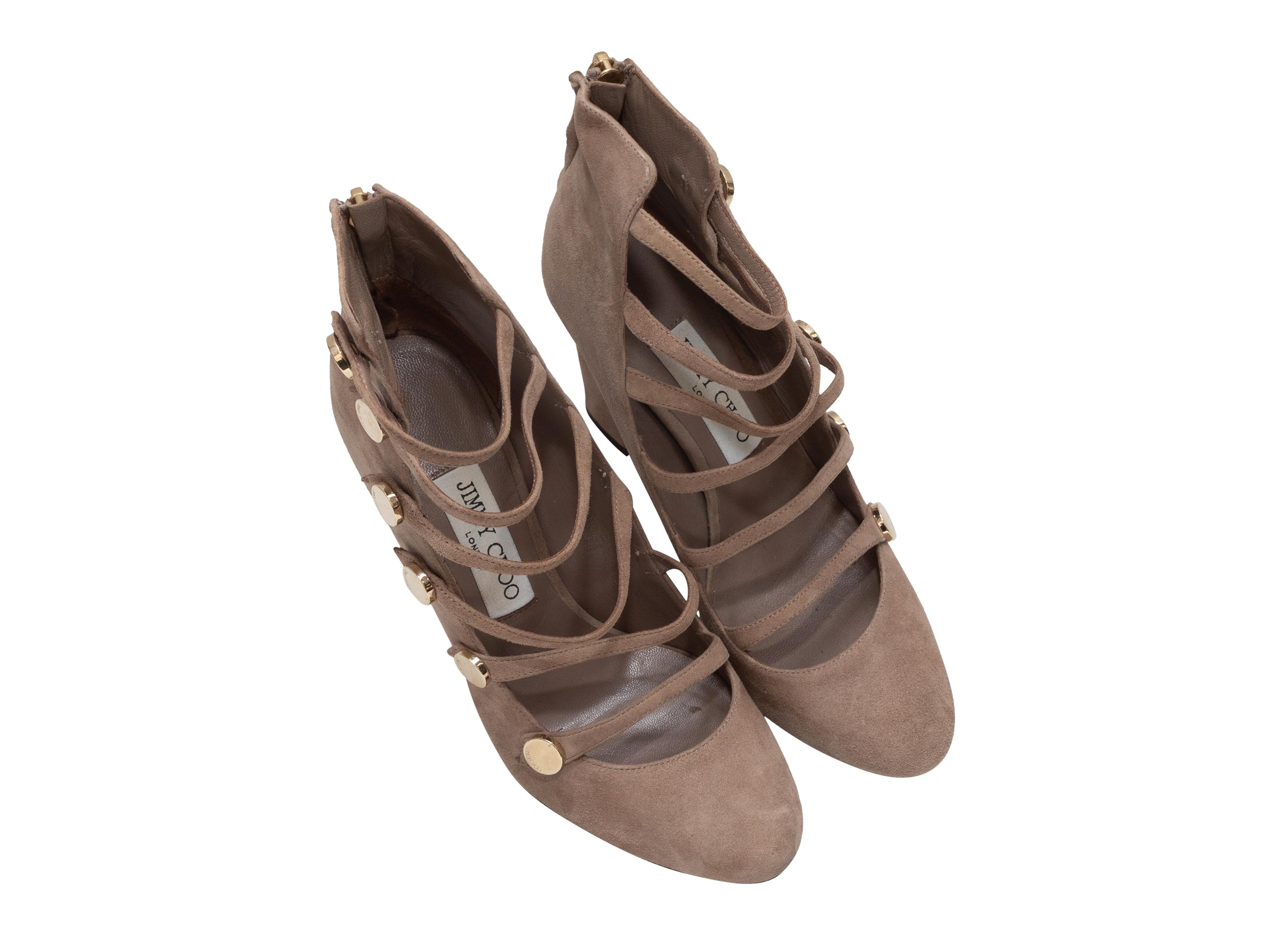 Brown suede strappy heeled booties by Jimmy Choo. Block heels. Zip closures at counters. 4.25