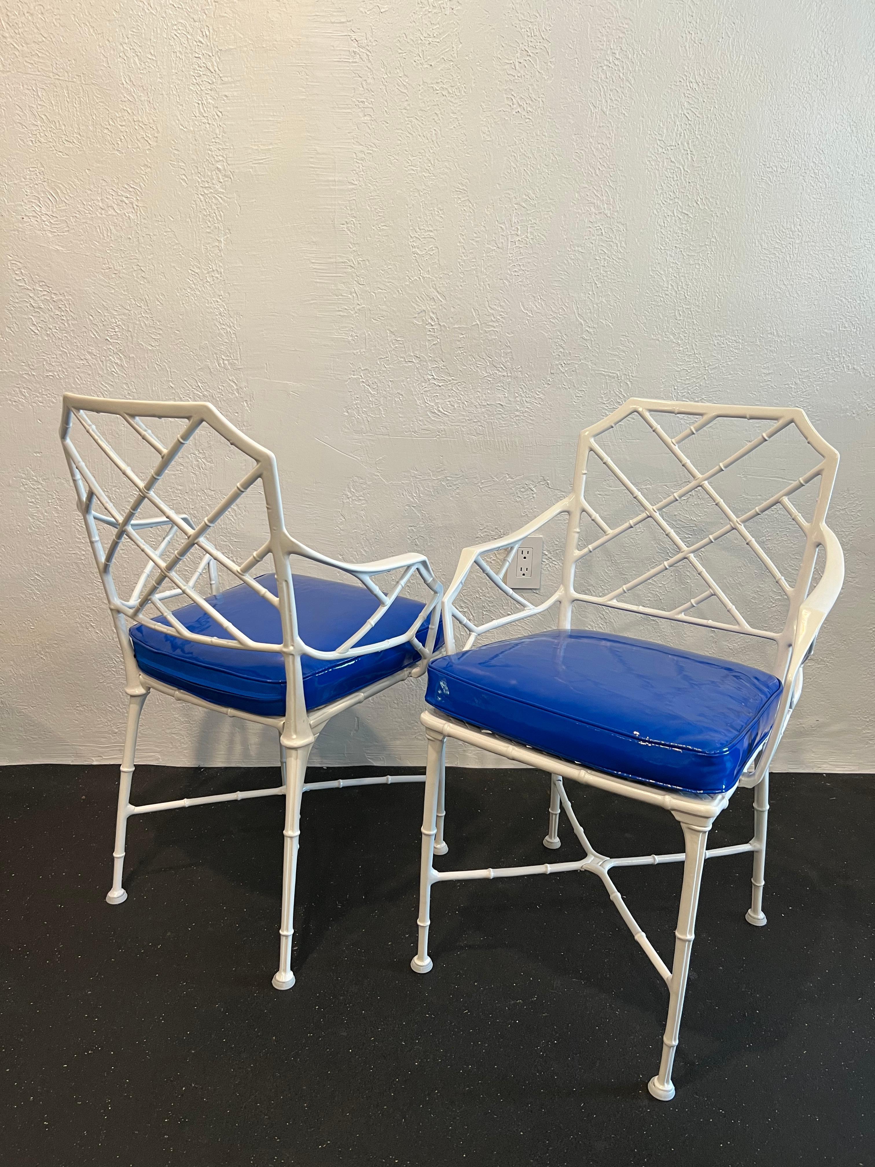 Pair of Brown Jordan Calcutta armchairs. The frames have been freshly powdercoated. New cushions fabricated in royal blue patent leather. 

Would work well in a variety of interiors such as modern, mid century modern, Hollywood regency, etc. Piece