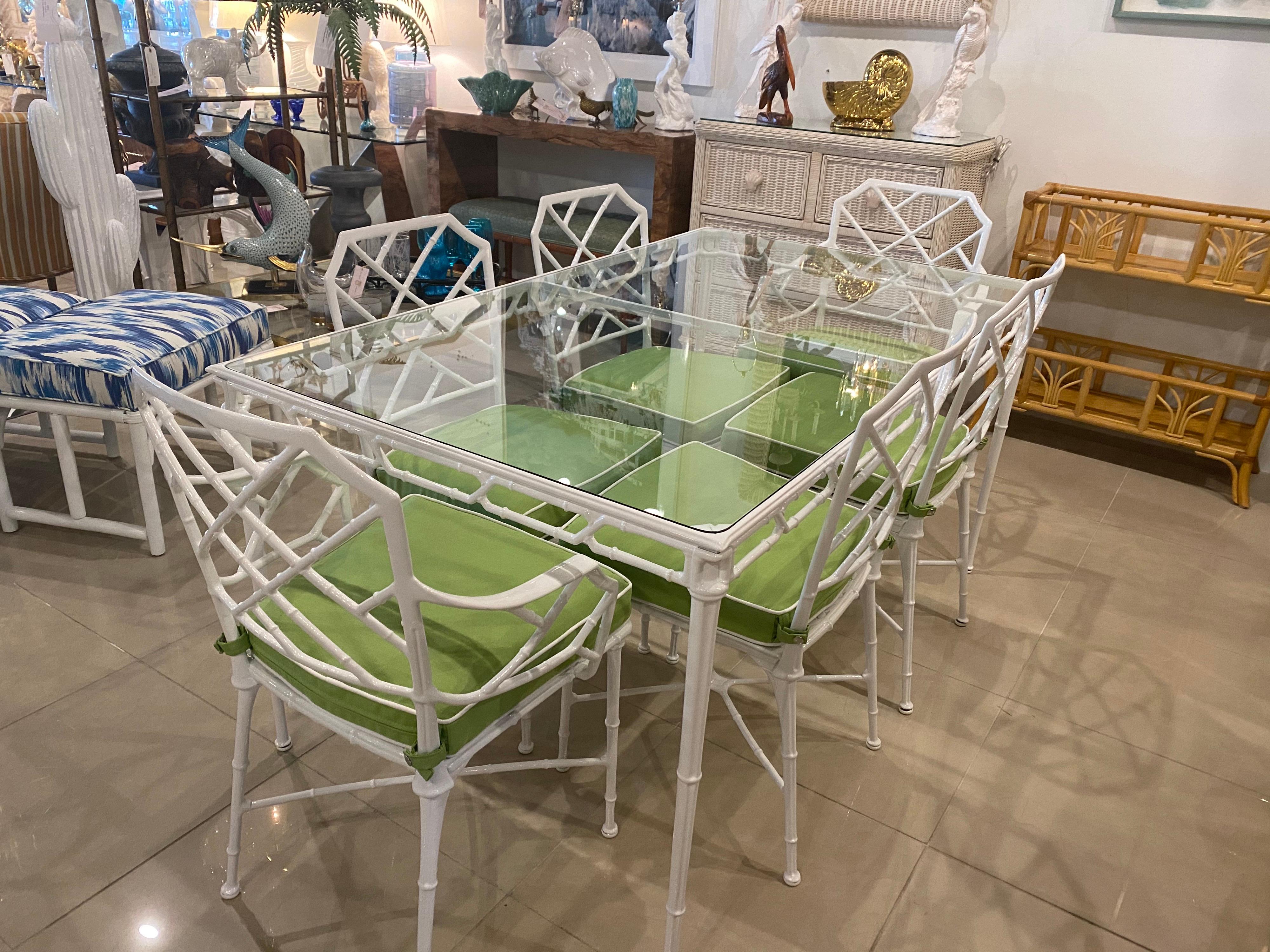 This lovely 7 piece brown Jordan Calcutta dining set has been professionally restored from top to bottom! This has been newly powder-coated in a fresh white. New custom glass top has been cut for this table. All new stainless steel snap on cushions
