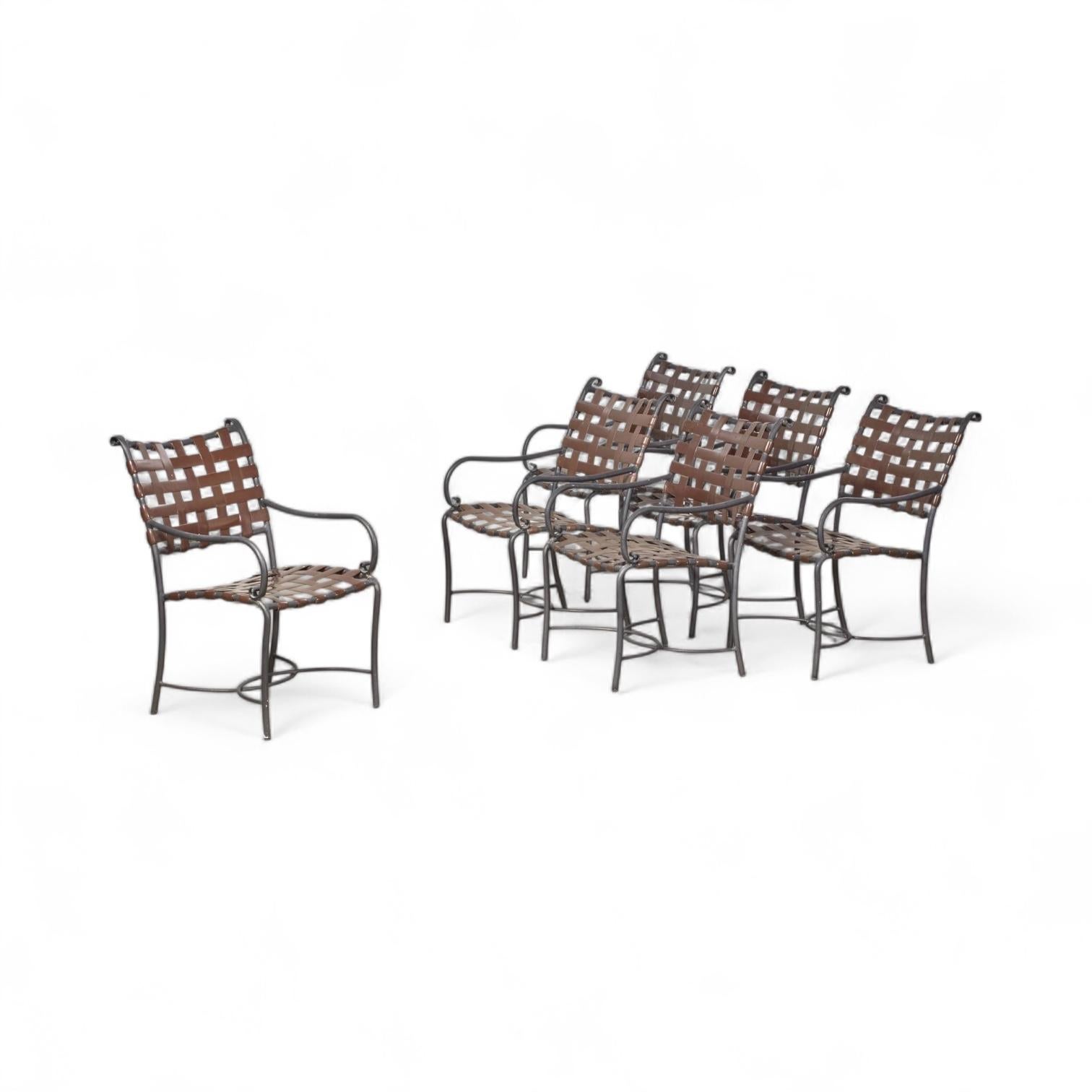 This is a set of Brown Jordan set of six arm chairs for the perfect patio dining. They are tagged. The basket weave design appears to be vinyl with no visible tearing. Brown Jordan sets the standard for quality in the industry and is still in