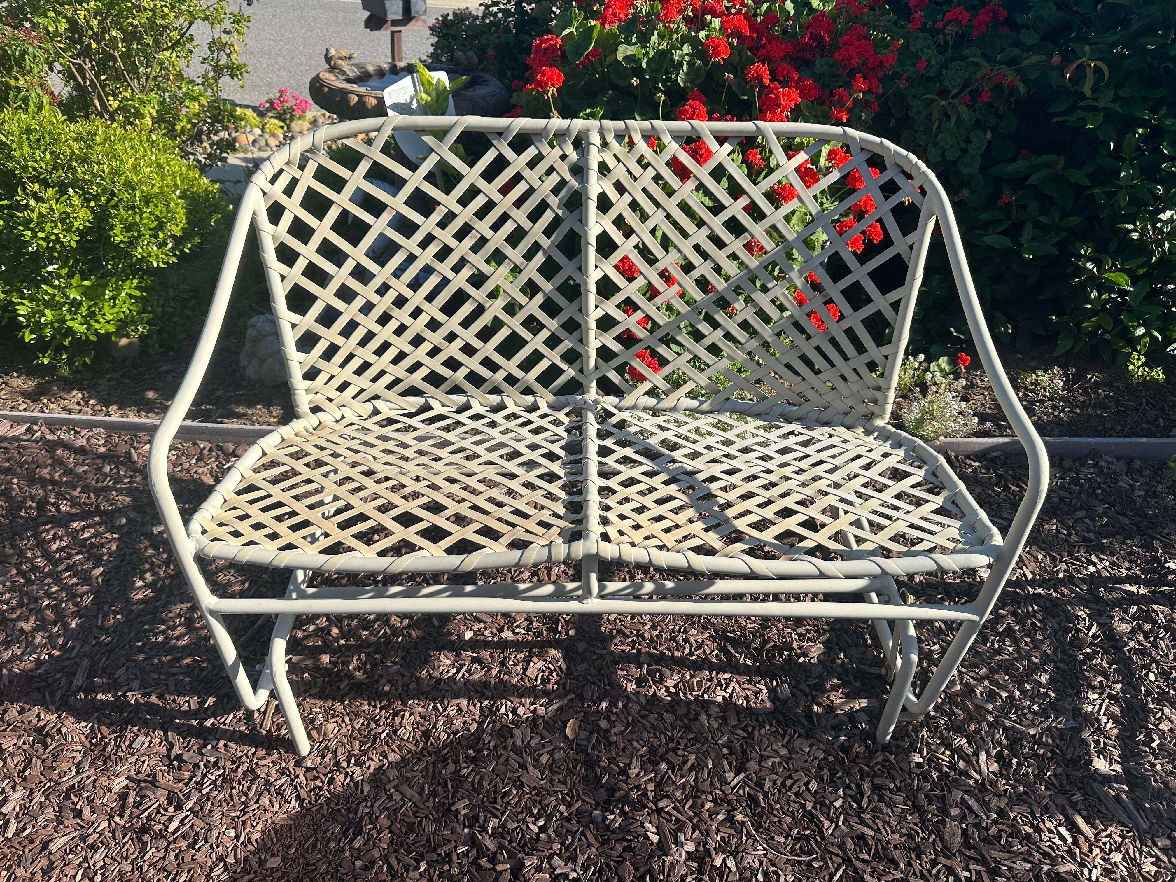 Vintage rare gliding chair by Brown Jordan,Glider
Tamiami collection 
circa 1960’s
Measures
45” wide, 31” length, 32” height, 17” floor to top of the seat
Works great
All the straps in good condition 
Made in USA

