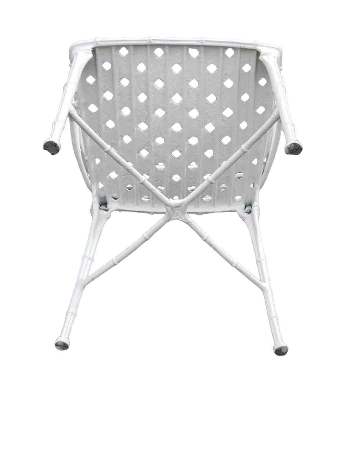 Set of four metal  Patio Set Chairs in  Beautiful aged white paint. Wear from age and use tot he body. 
Chairs 20w. x 17.5d x 32.5 h

We are also listing the Brown Jordan Table with glass top separately as shown with the chairs in the last image. 