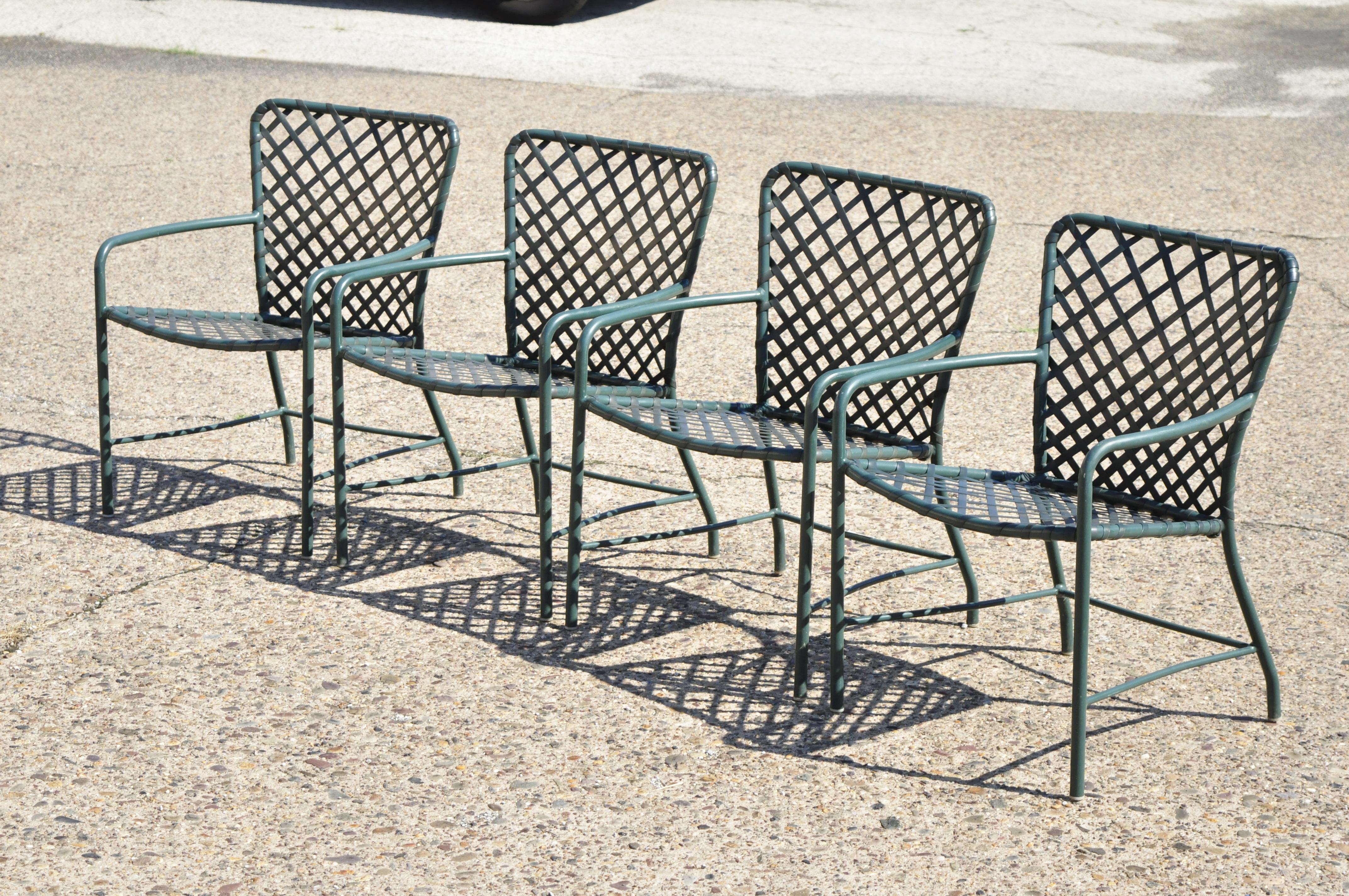 Brown Jordan Tamiami green aluminum vinyl strap patio pool armchairs - set of 4. Item features woven vinyl seats and backs, aluminum construction, clean modernist lines, quality American craftsmanship, great style and form, circa mid-late 20th