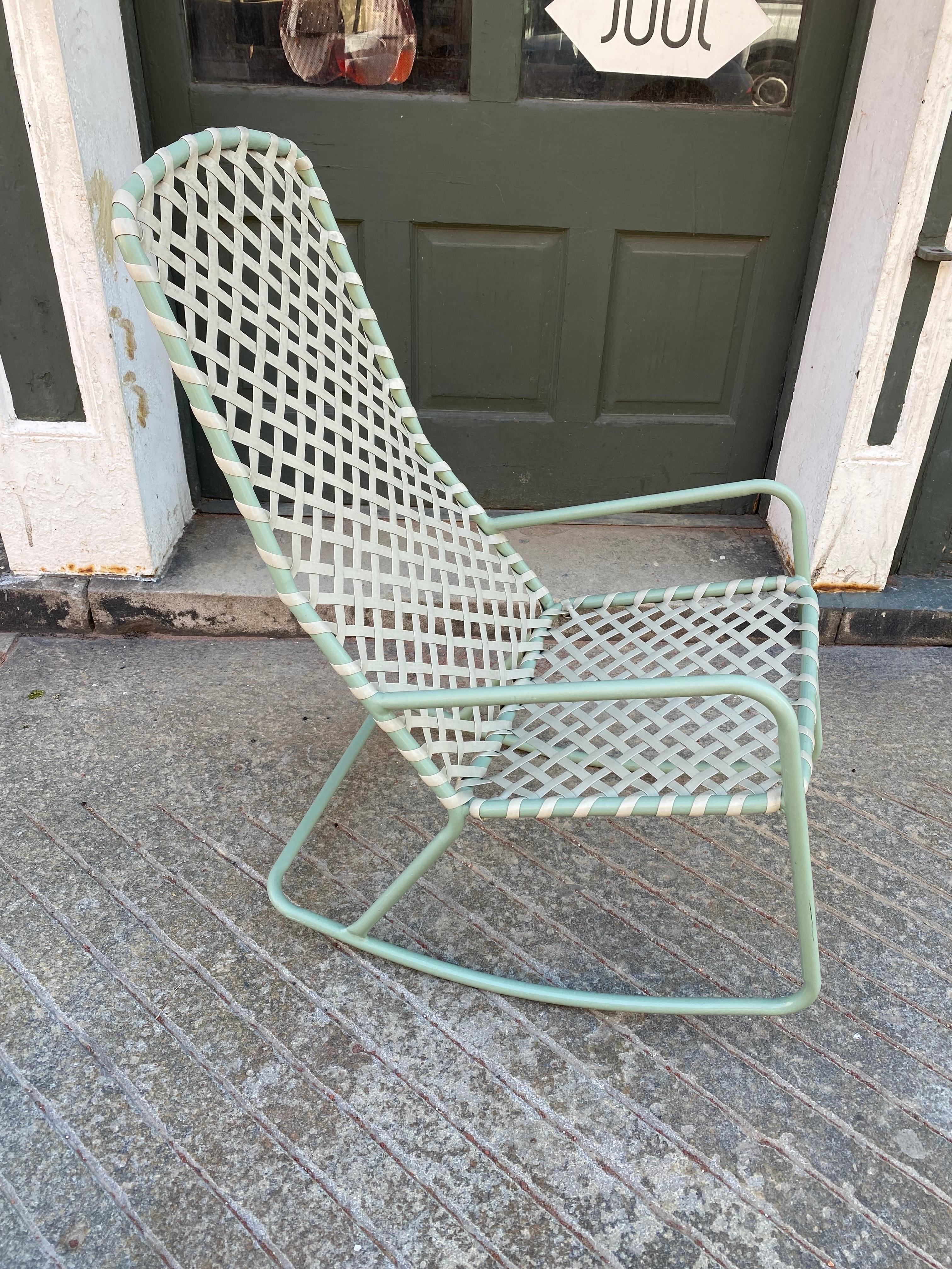 Brown Jordan Aluminum Rocker with Woven Straps.  Frame is in a light green finish.  All original and in nice condition.  Matching Chairs and Table Available as well!
