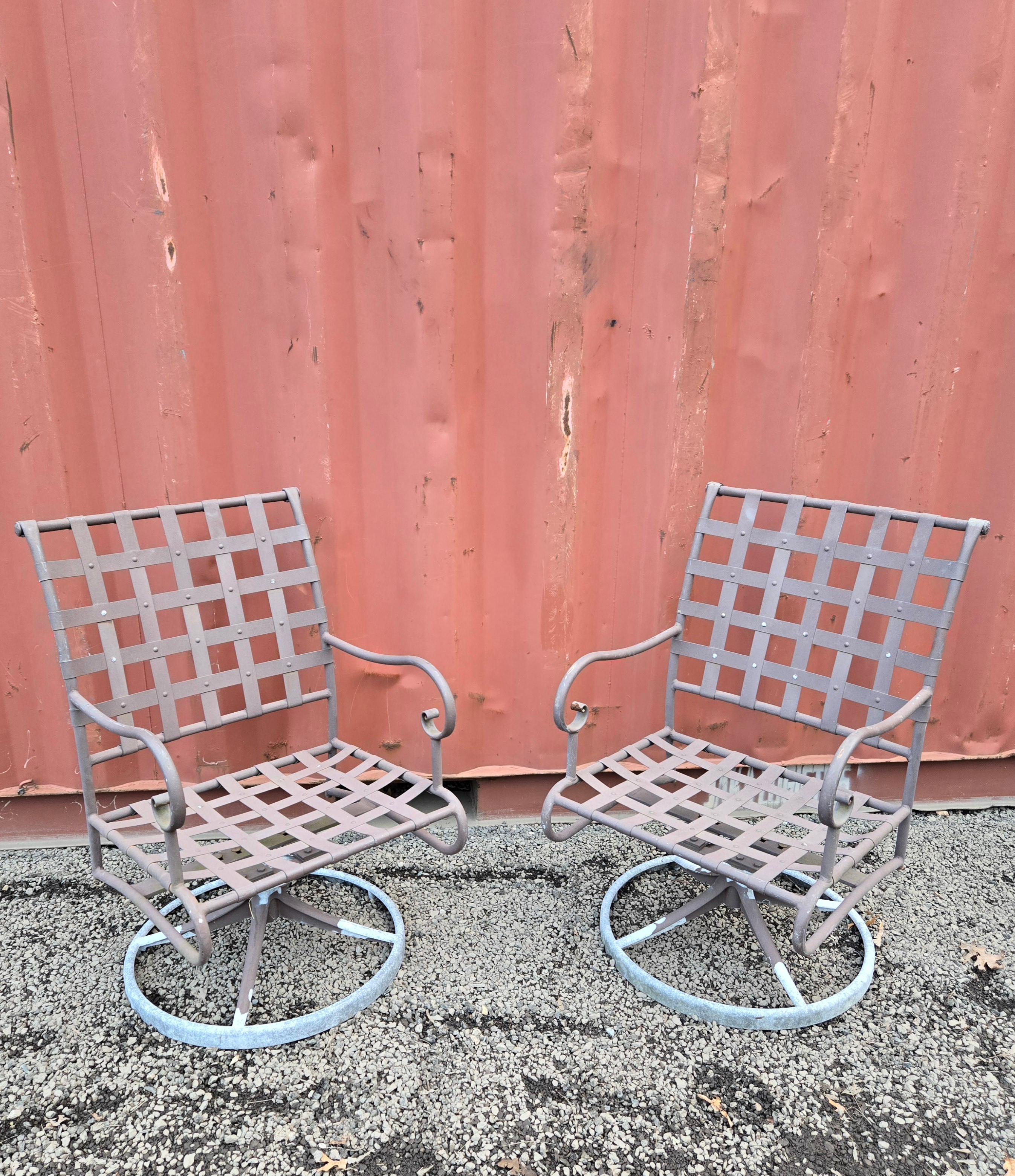 
This vintage wrought iron patio furniture set by Brown Jordan is perfect for your outdoor deck, garden, or patio. The swivel seats are comfortable and perfect to relax in poolside.


The mid-century modern style and brown color of chairs make this
