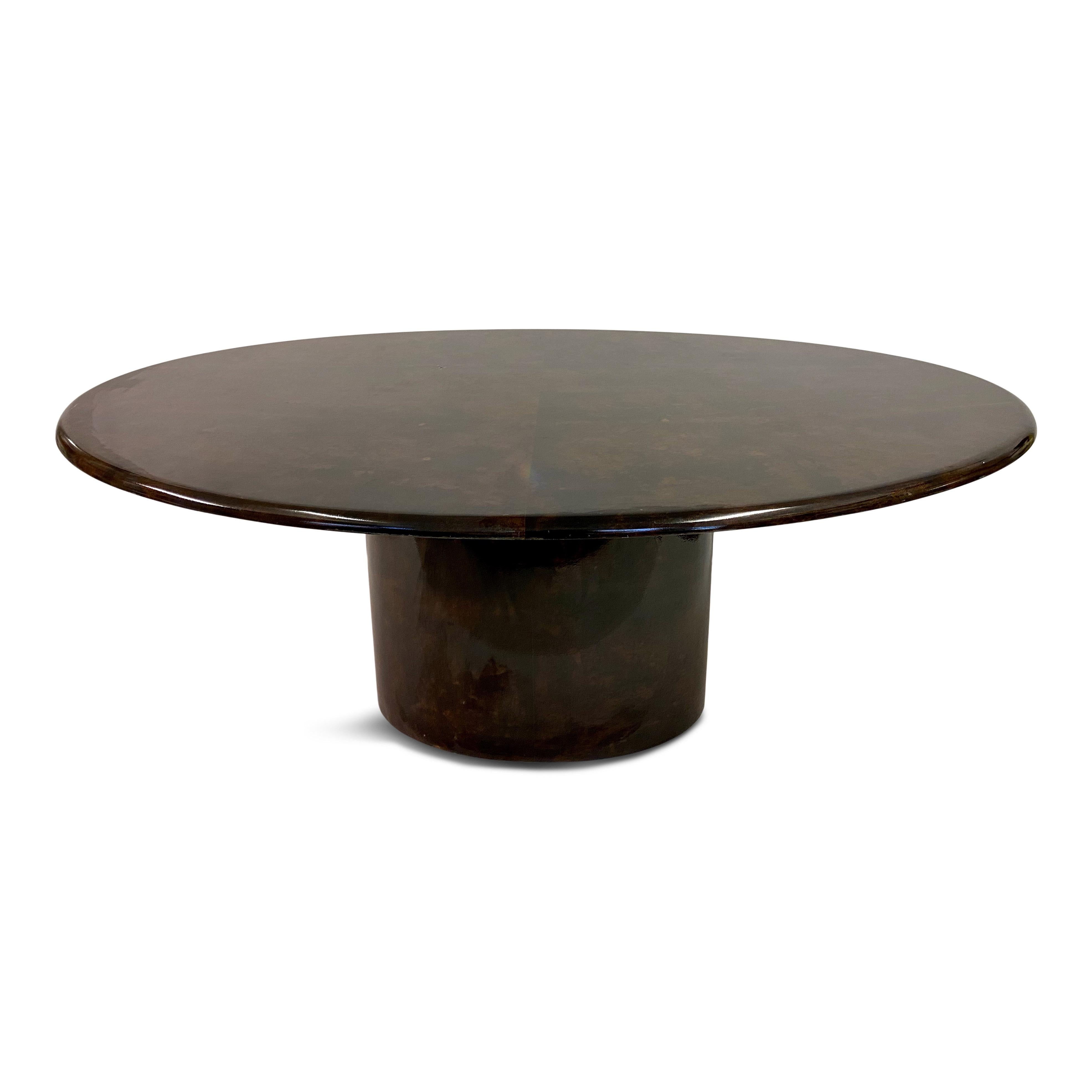 Dining table

Brown lacquered goatskin

By Aldo Tura

Oval shaped

Oval base

1960s-1970s Italy.