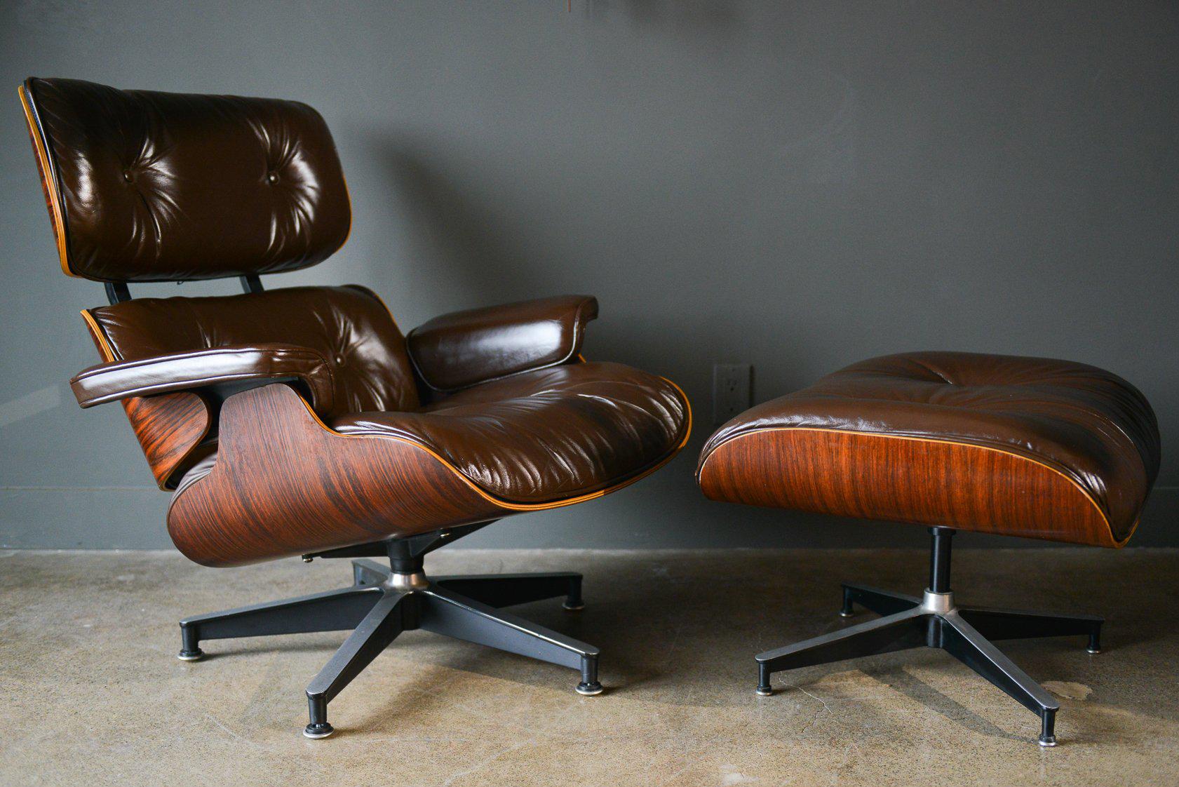 Chocolate brown leather and rosewood Eames lounge chair and ottoman. Designed by Charles Eames for Herman Miller. Model 670/671. Gorgeous leather with just the right amount of suppleness. Excellent vintage condition, rosewood frame has beautiful