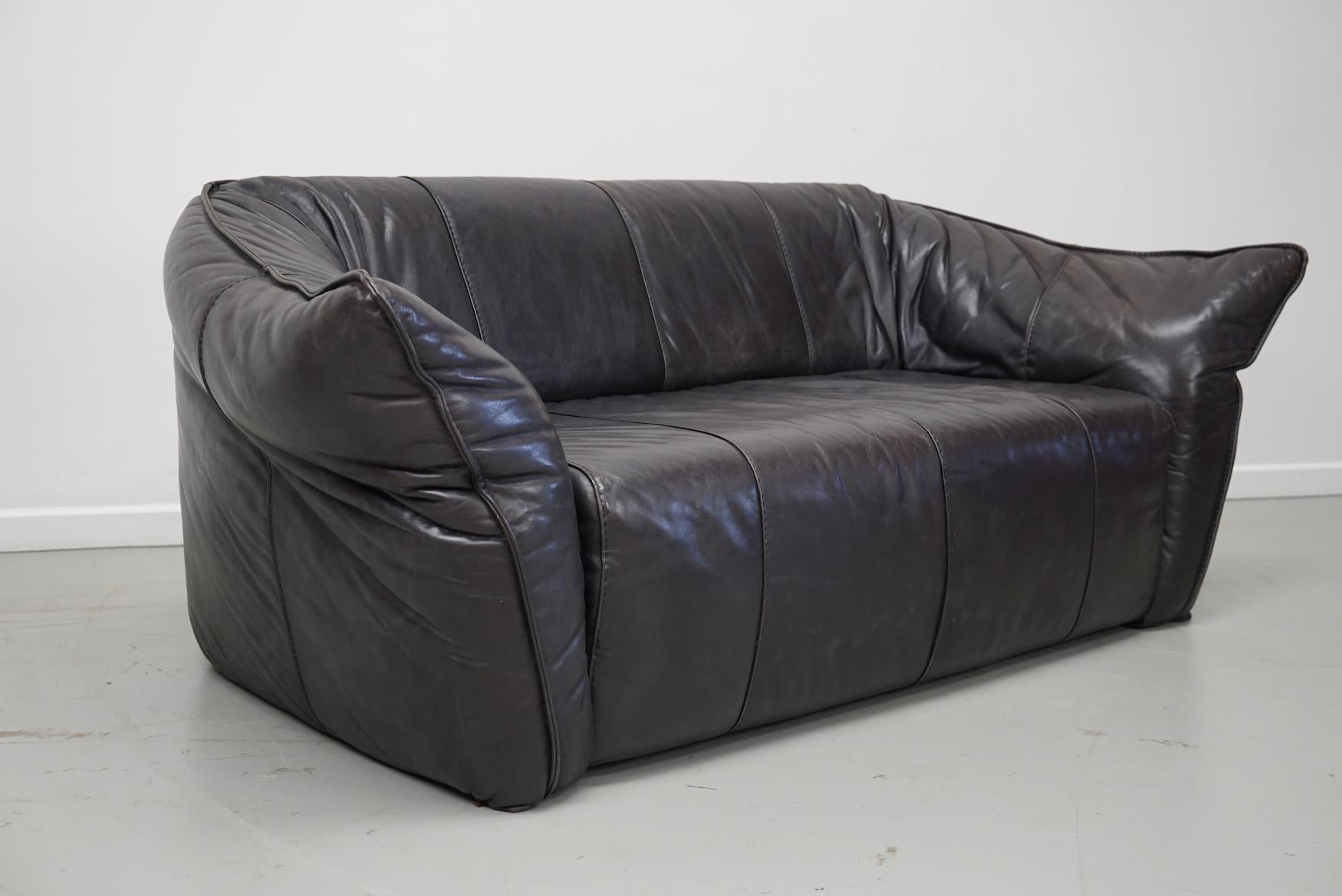 This brown sofa, model Andes, was designed by Gerard van den Berg and made by Montis in the Netherlands 1970s. It was made of thick brown leather that retained a nice patina over the years of use and is in a good vintage condition.
