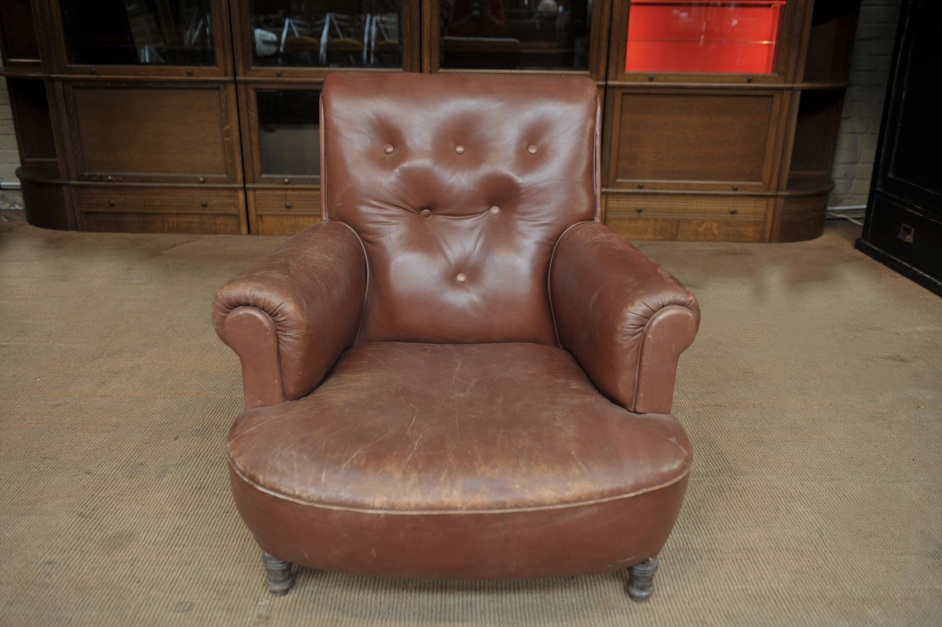 Brown Leather Napoleon III armchair, all original, brown leather oak feet, France, circa 1880/1900.