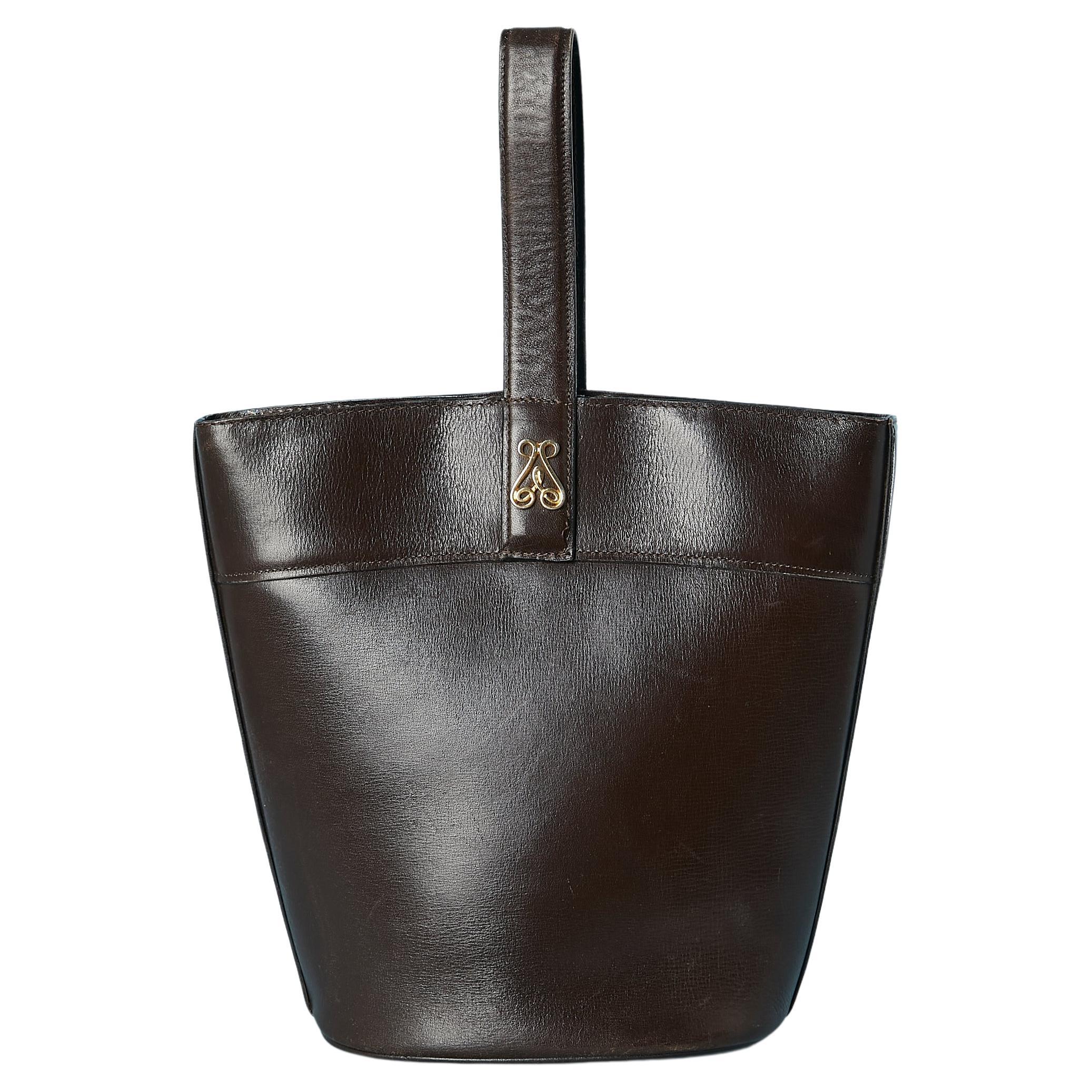 Brown leather bucket bag with soft leather bag with drawstring inside Rochas  For Sale