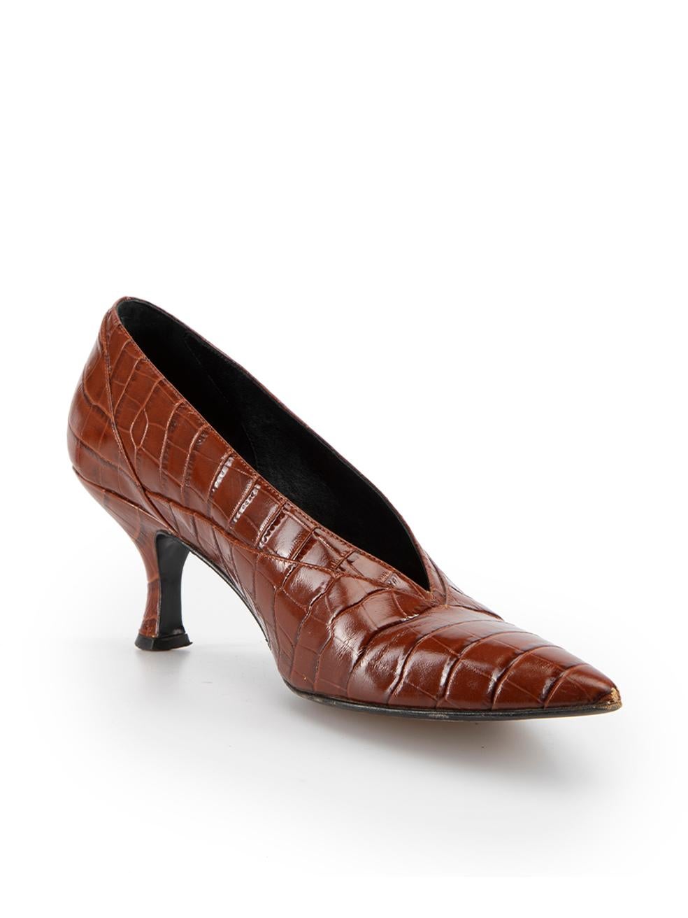 CONDITION is Very good. Minimal wear to shoes is evident. Minimal wear to both toes and the left-shoe heel with light scuffing on this used Erdem designer resale item. 



Details


Brown

Leather

Slip on heels

Croc embossed pattern

Pointed