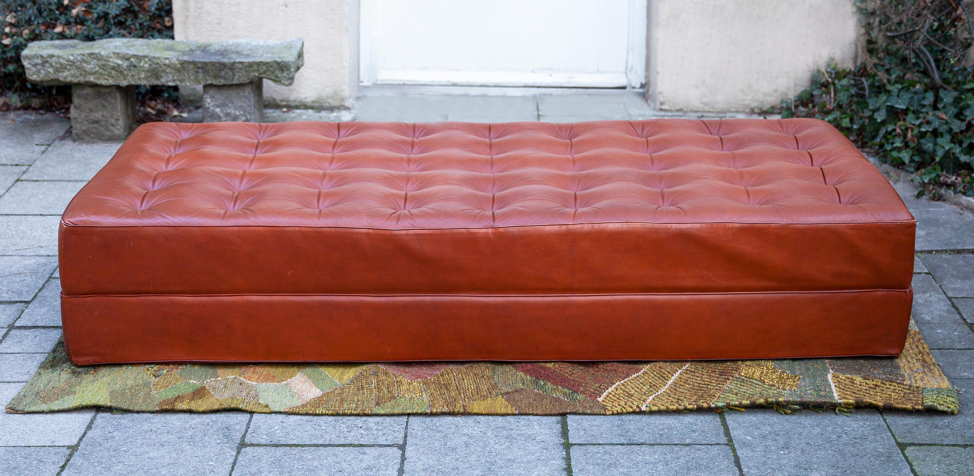 Very rare daybed by Alfred Kill International attributed to Horst Brüning, made in Germany, 1970s.

The daybed can be easily turned in a comfortable double bed. Very good vintage condition in, original brown cognac leather, soft foam and a linen