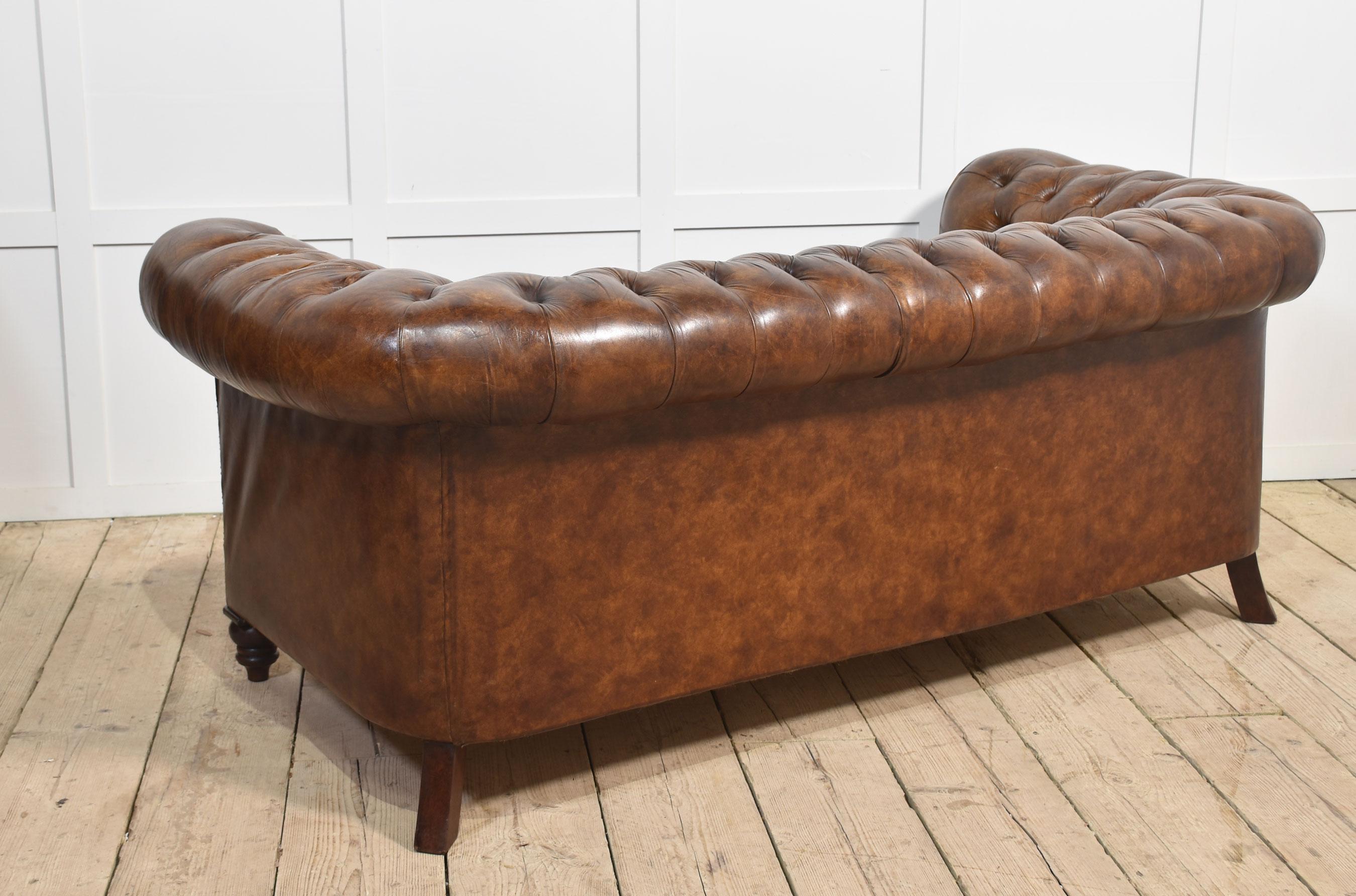 Brown leather deep buttoned chesterfield 9