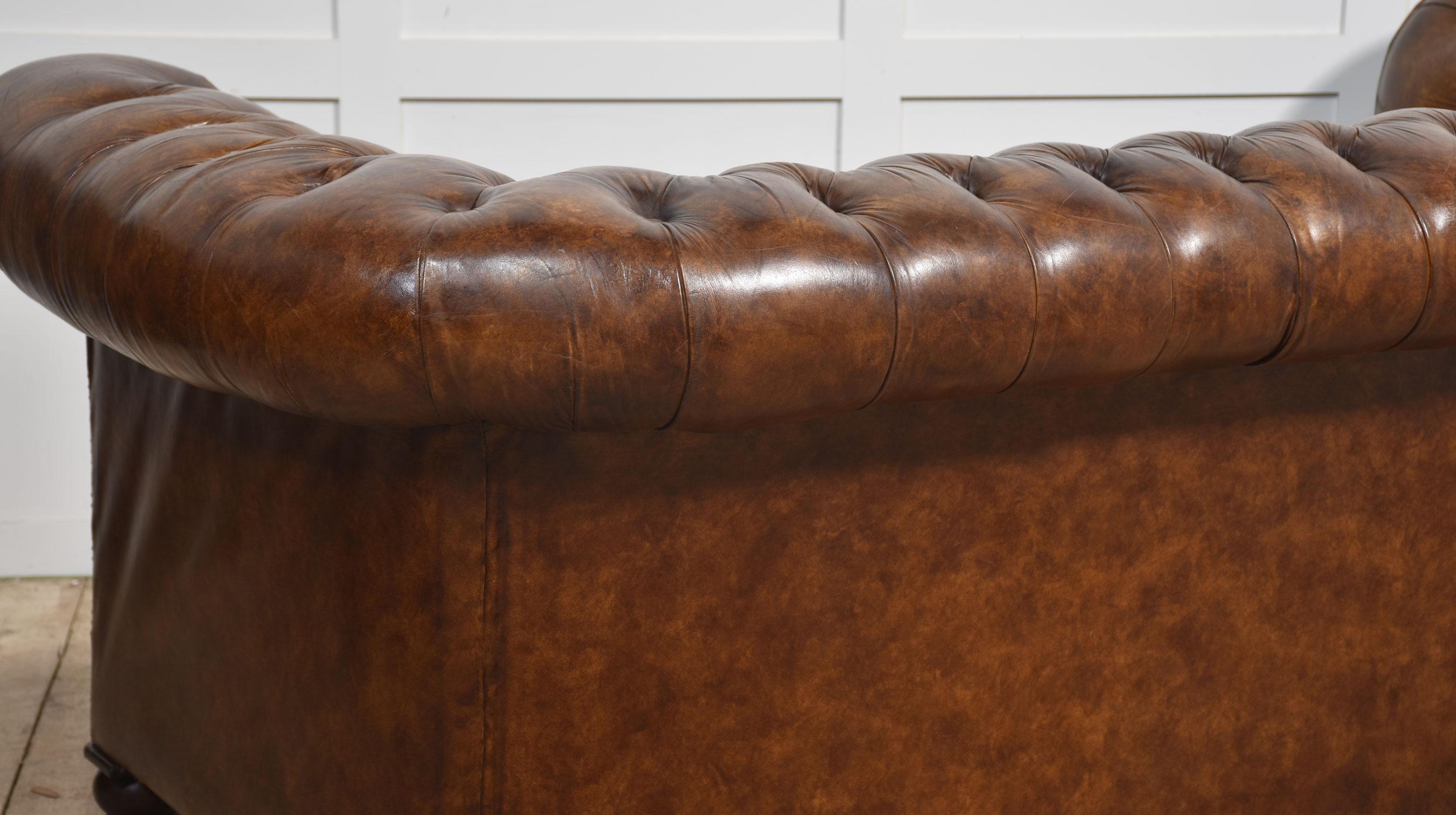 Brown leather deep buttoned chesterfield 10