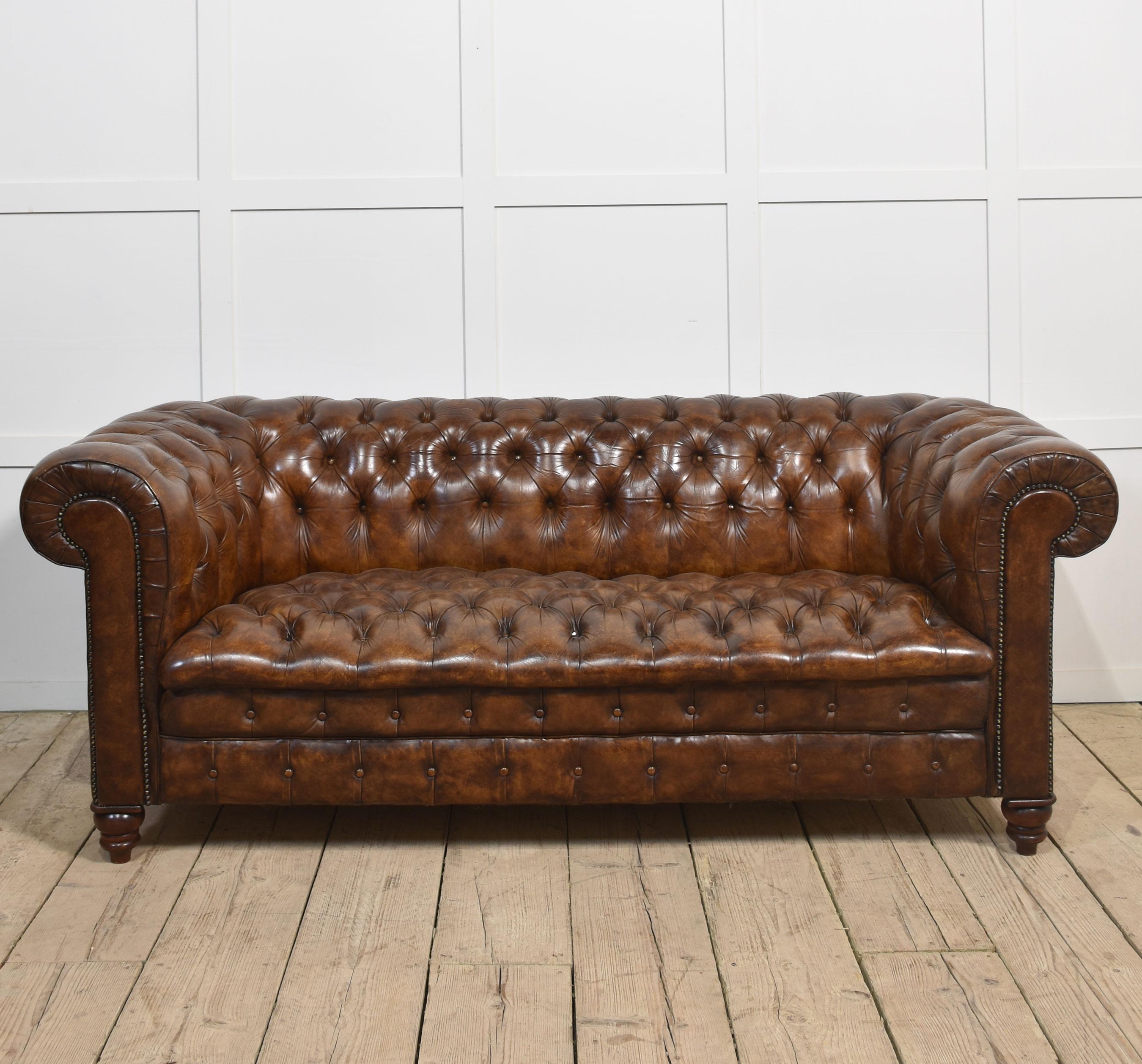 Large brown leather Chesterfield sofa, having deep buttoned back and seat, All raised up on turned feet. Good solid condition, and the leather is soft, and nicely worn in.
Dimensions
Height 31 Inches height to seat 18 Inches
Width 79 Inches
Depth 36