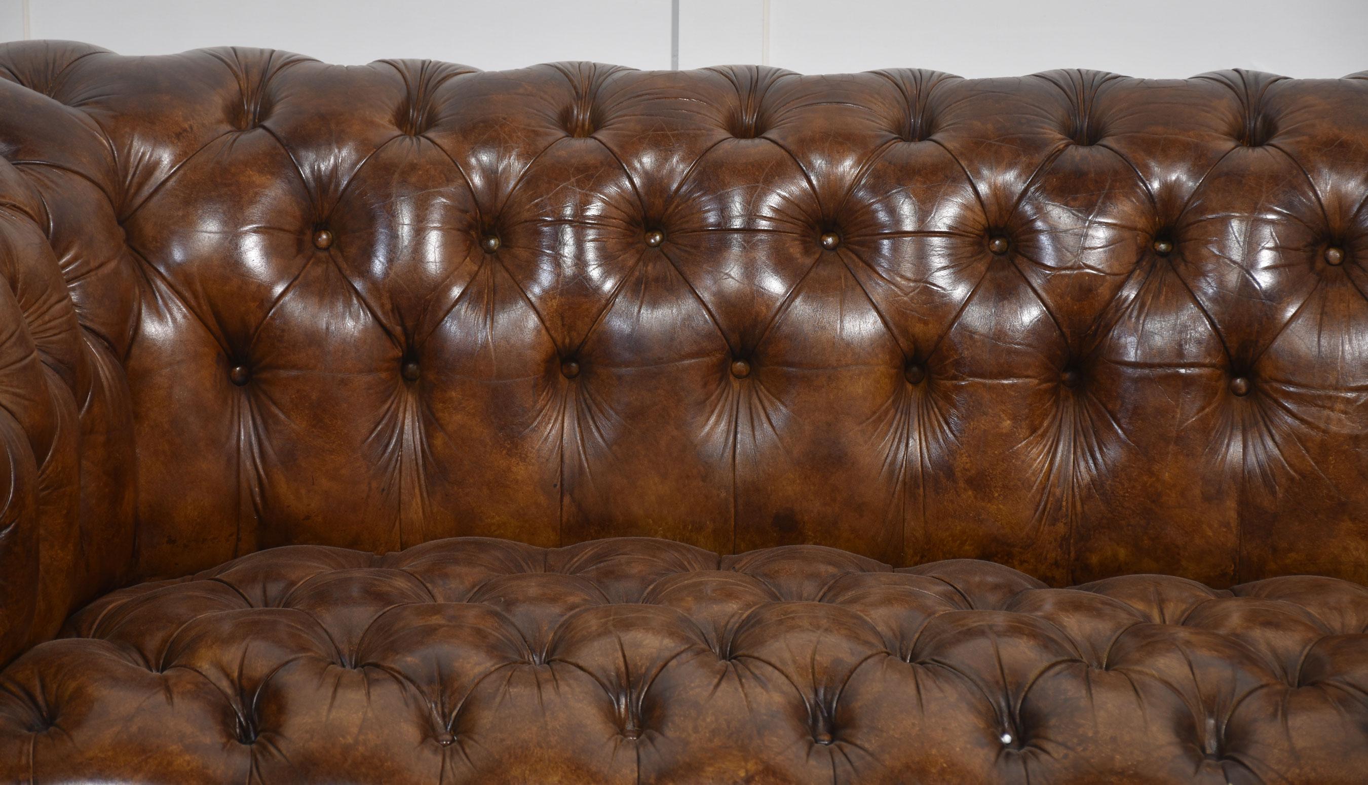 20th Century Brown leather deep buttoned chesterfield