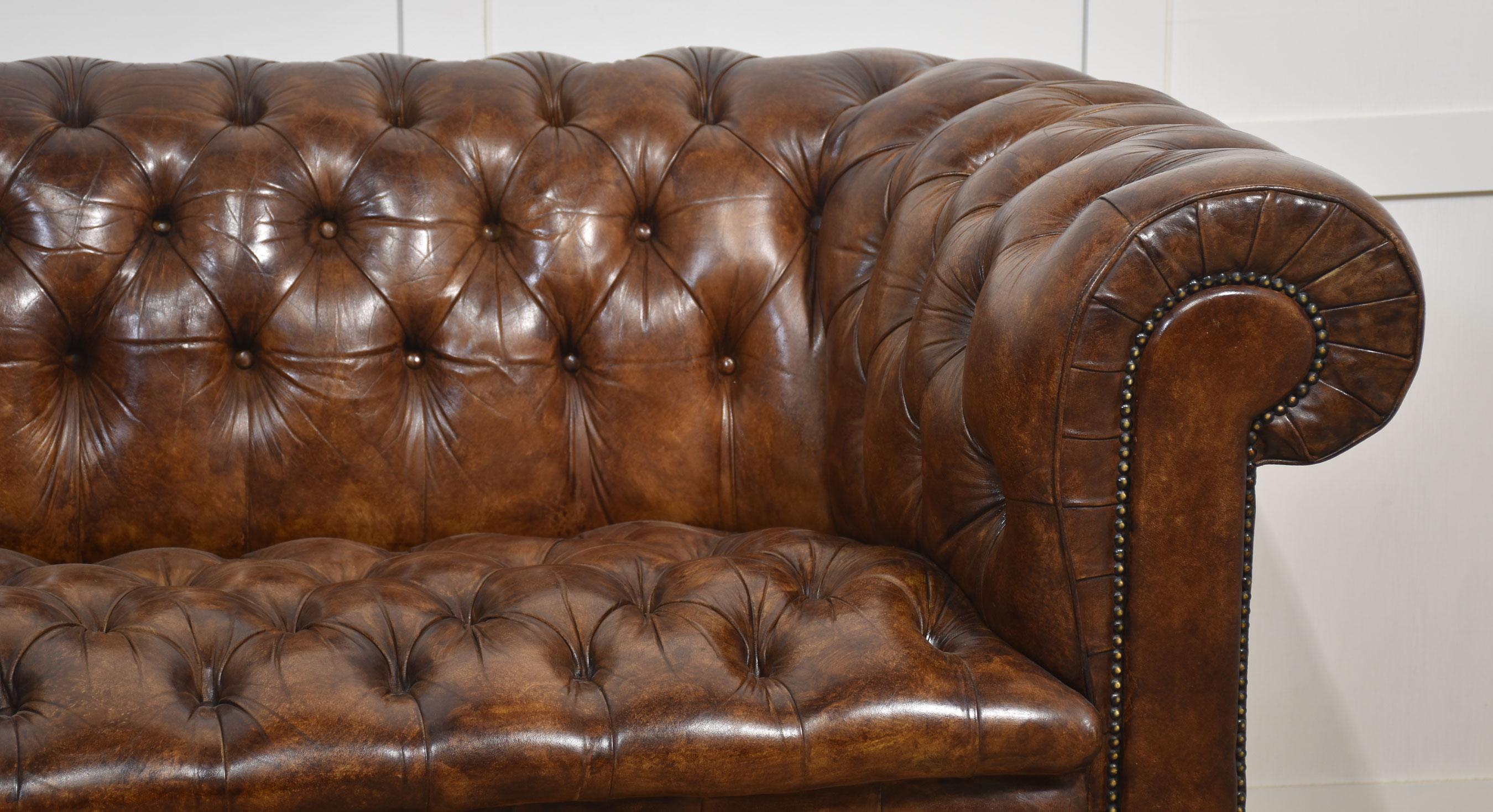 Brown leather deep buttoned chesterfield 1