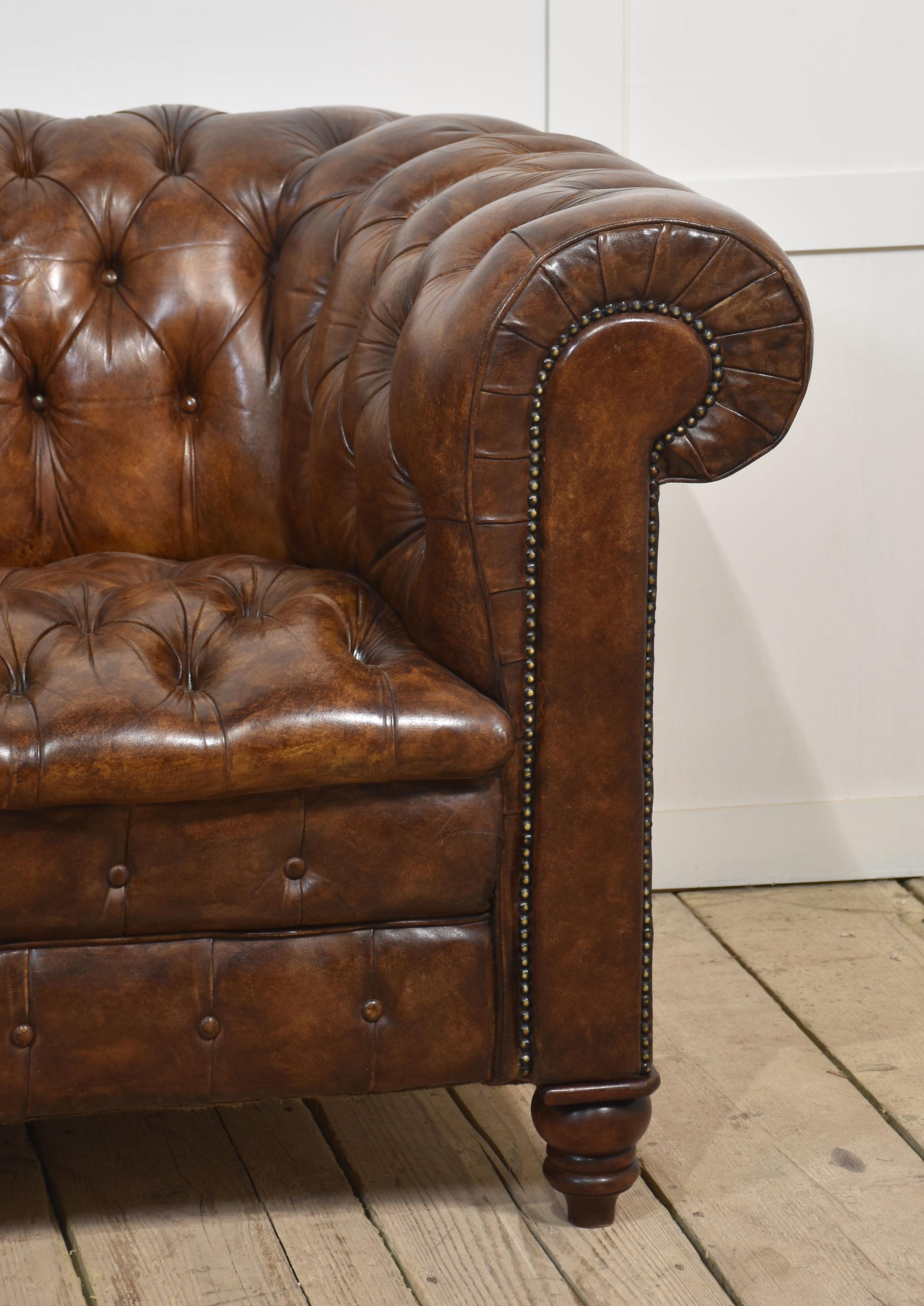Brown leather deep buttoned chesterfield 2