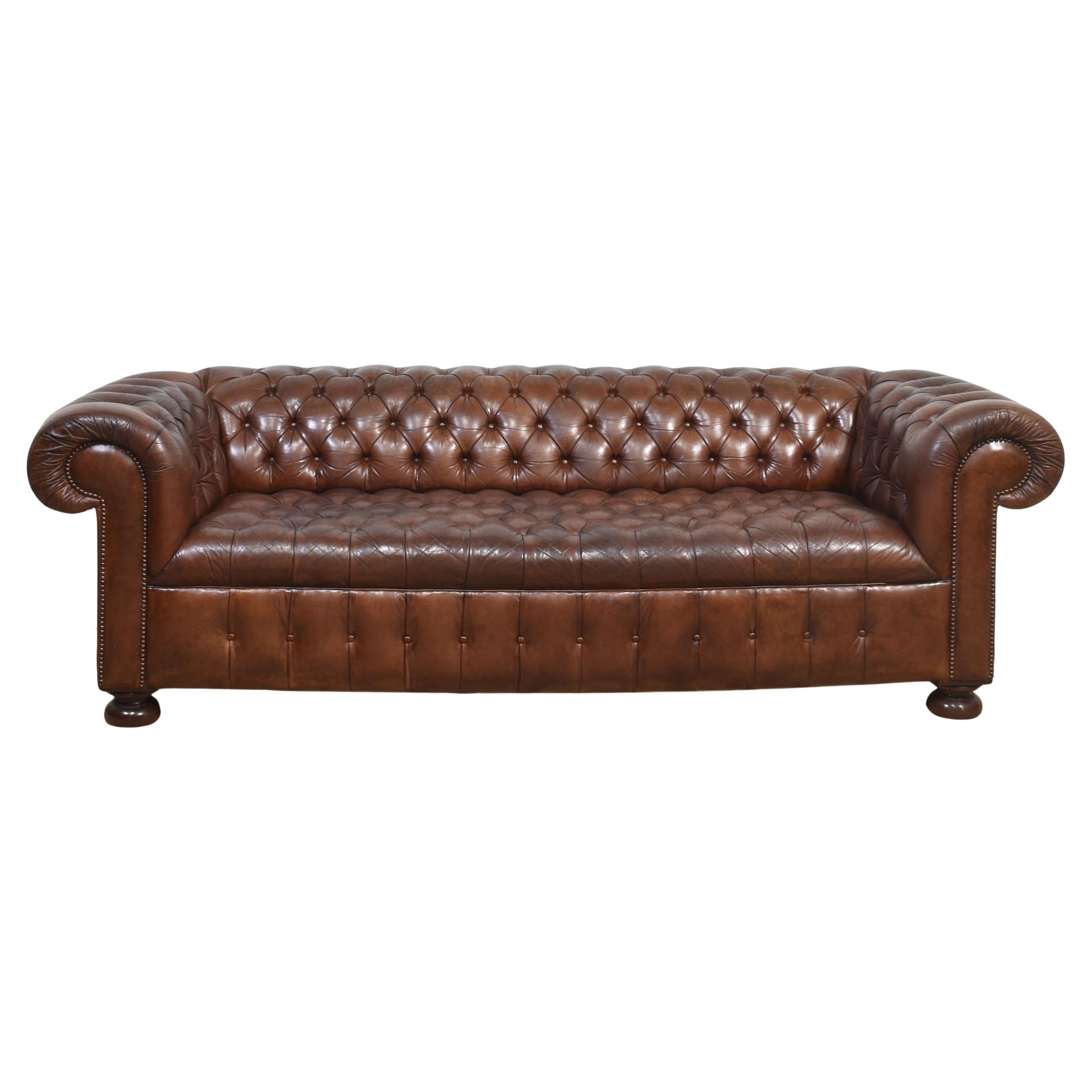 Brown leather deep buttoned chesterfield