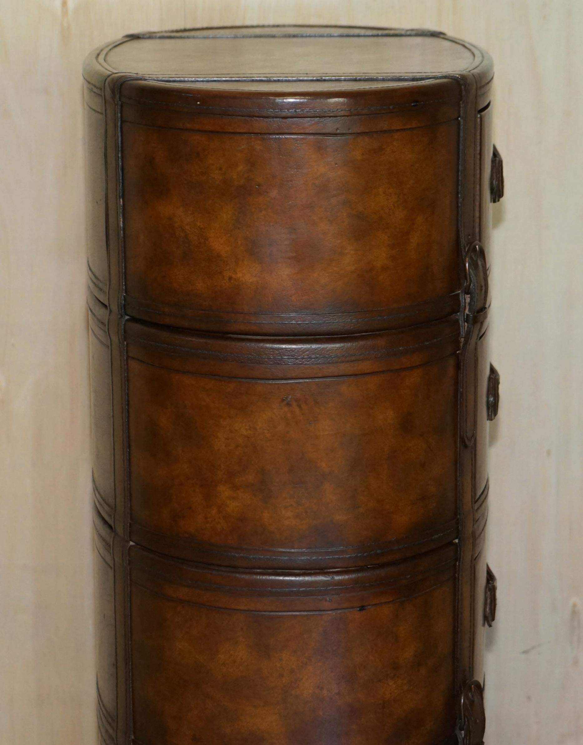 Brown Leather Oval Tallboy Chest of Drawers with Luggage Style Straps or Belts 2
