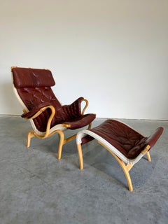 Brown Leather Pernilla Chair and Ottoman by Bruno Mathsson for DUX Sweden