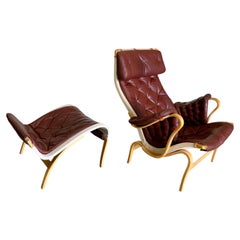 Brown Leather Pernilla Chair and Ottoman by Bruno Mathsson for DUX Sweden
