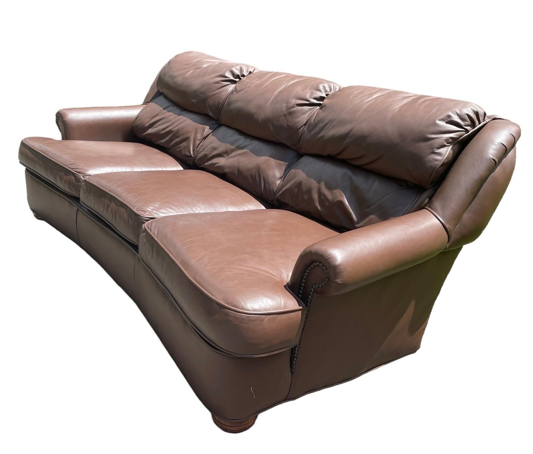 Stunning vintage leather sofa in the style of Restoration Hardware and vintage Ralph Lauren. In gorgeous vintage condition, looks never used.

The leather is thick and a rick chocolate color i can’t capture properly with photos. it’s a stunning and