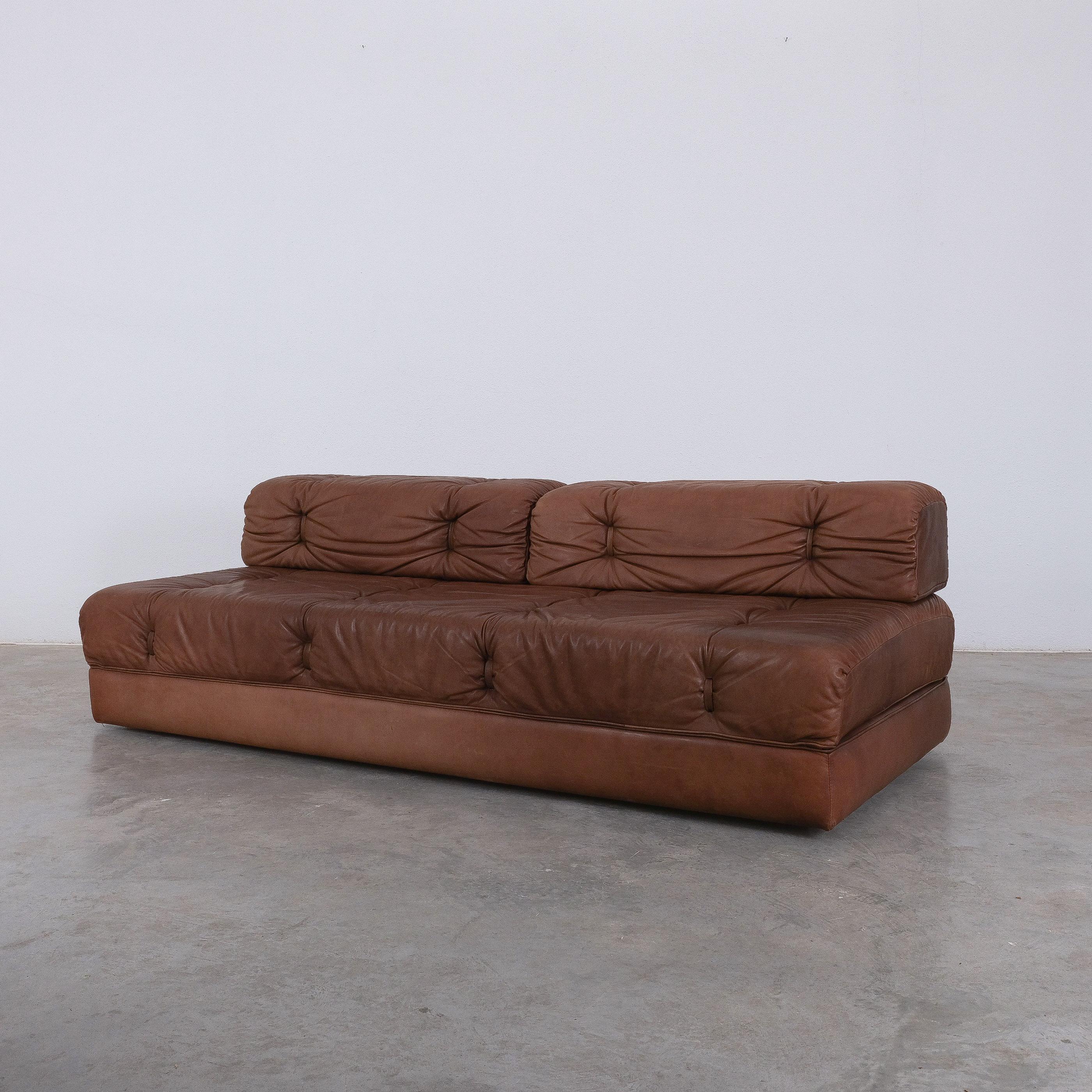 Brown leather bed- sofa Karl Wittmann‚ Atrium’  in original brown leather, Austria, circa 1970

Very well preserved convertible double-seat sofa by Karl Wittmann in original condition. The 'Atrium' was produced in the same era and style as many