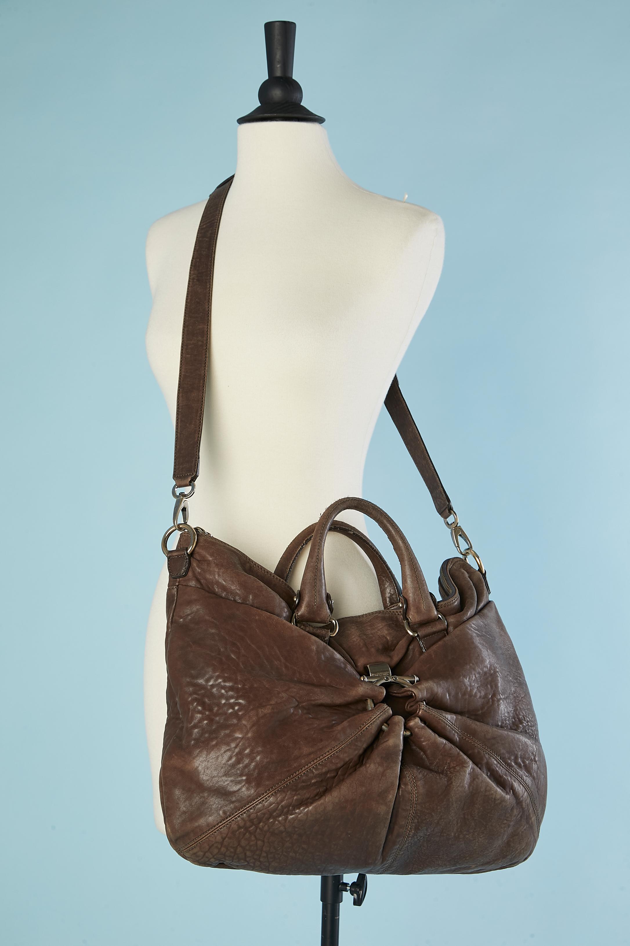 Women's Brown leather top handle bag with metal ring Salvatore Ferragamo  For Sale