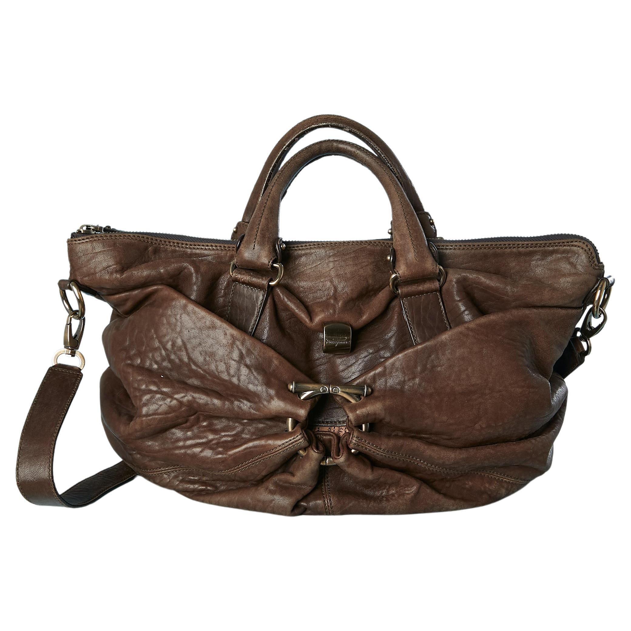 Brown leather top handle bag with metal ring Salvatore Ferragamo  For Sale