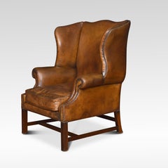Brown Leather Upholstered Wingback Armchair