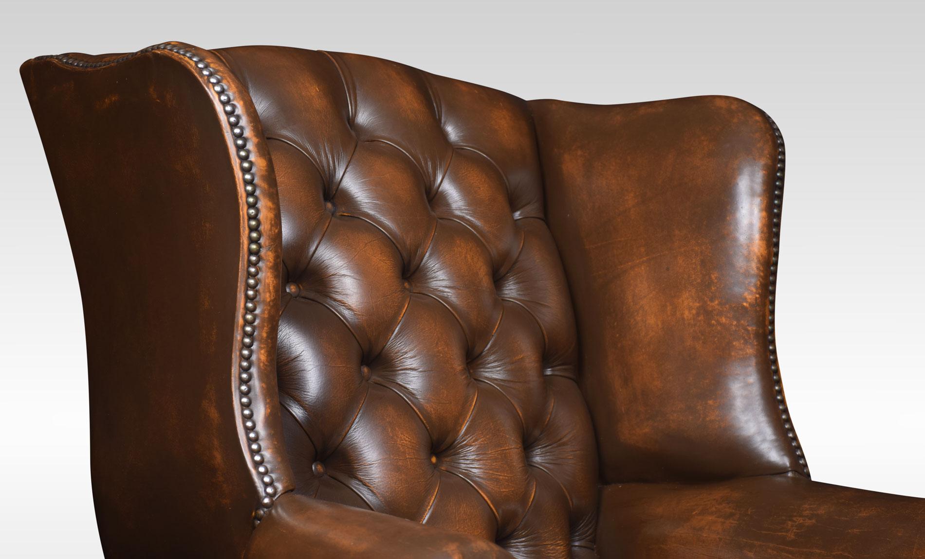 Brown Leather Upholstered Wingback Armchair In Good Condition For Sale In Cheshire, GB