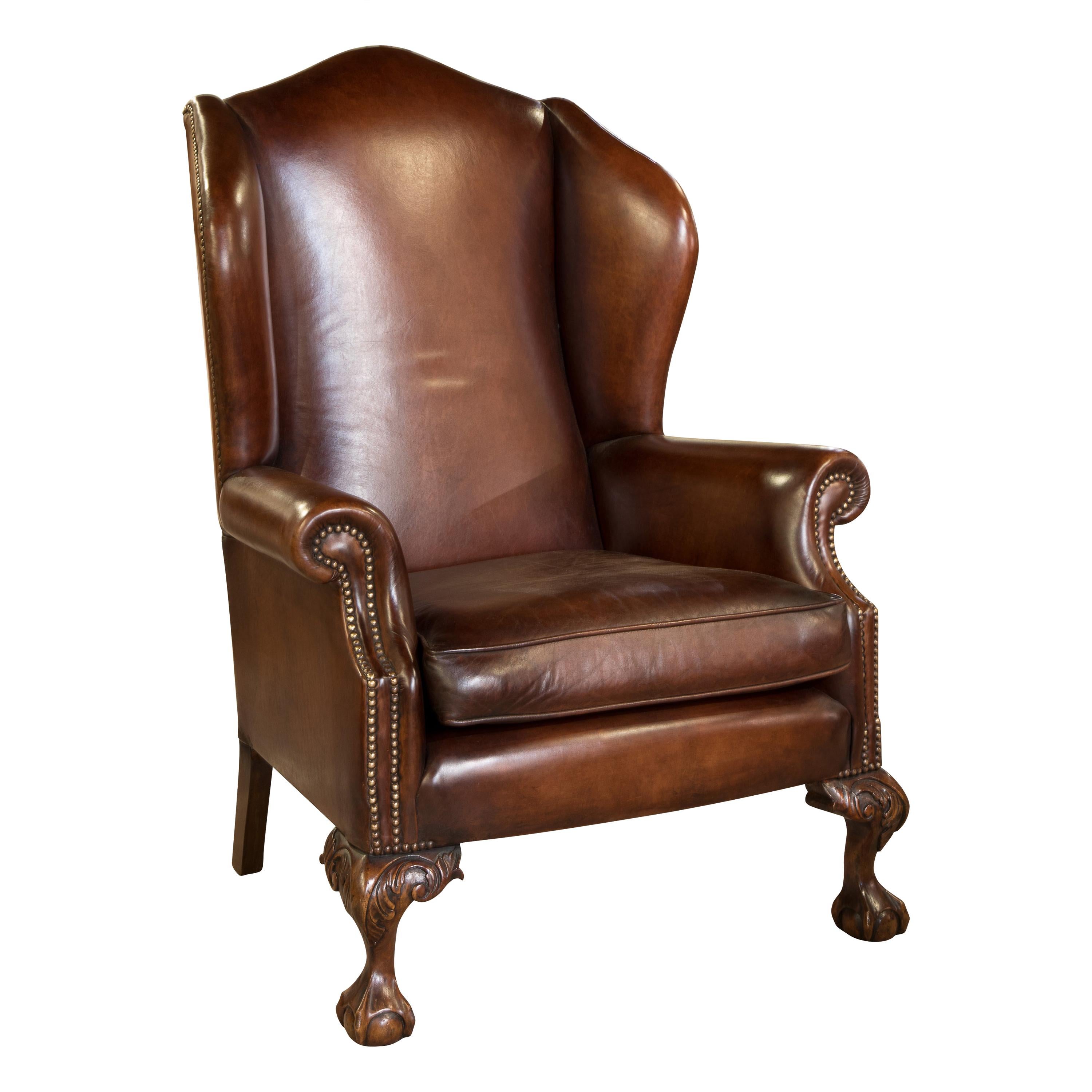 Brown Leather Wing Chair on Ball and Claw Legs, circa 1960 For Sale