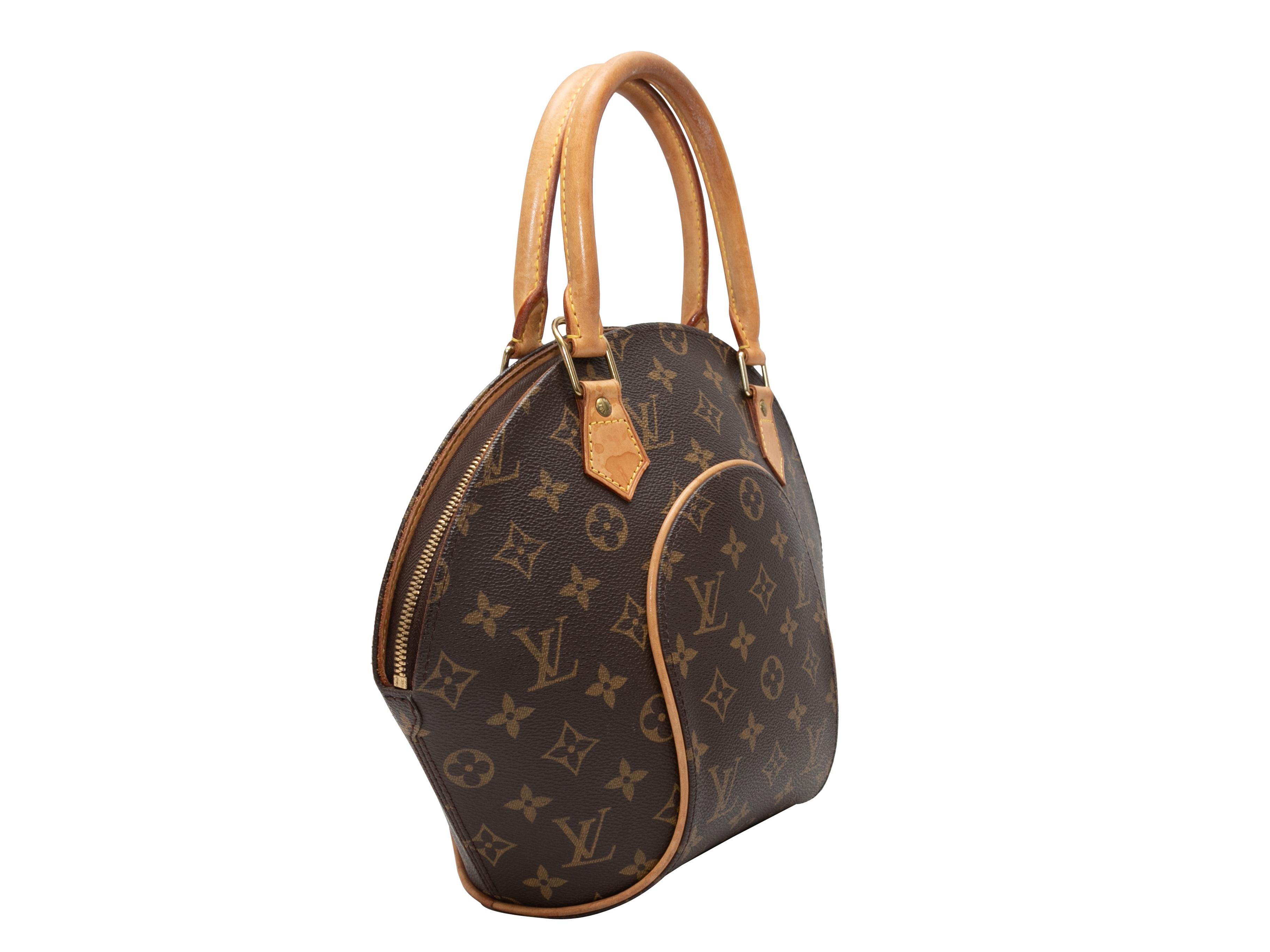 Brown Louis Vuitton Monogram Ellipse PM Bag. The Ellipse PM Bag features a monogram coated canvas body, gold-tone hardware, leather trim throughout, dual rolled top handles, and a top zip closure. 13.5