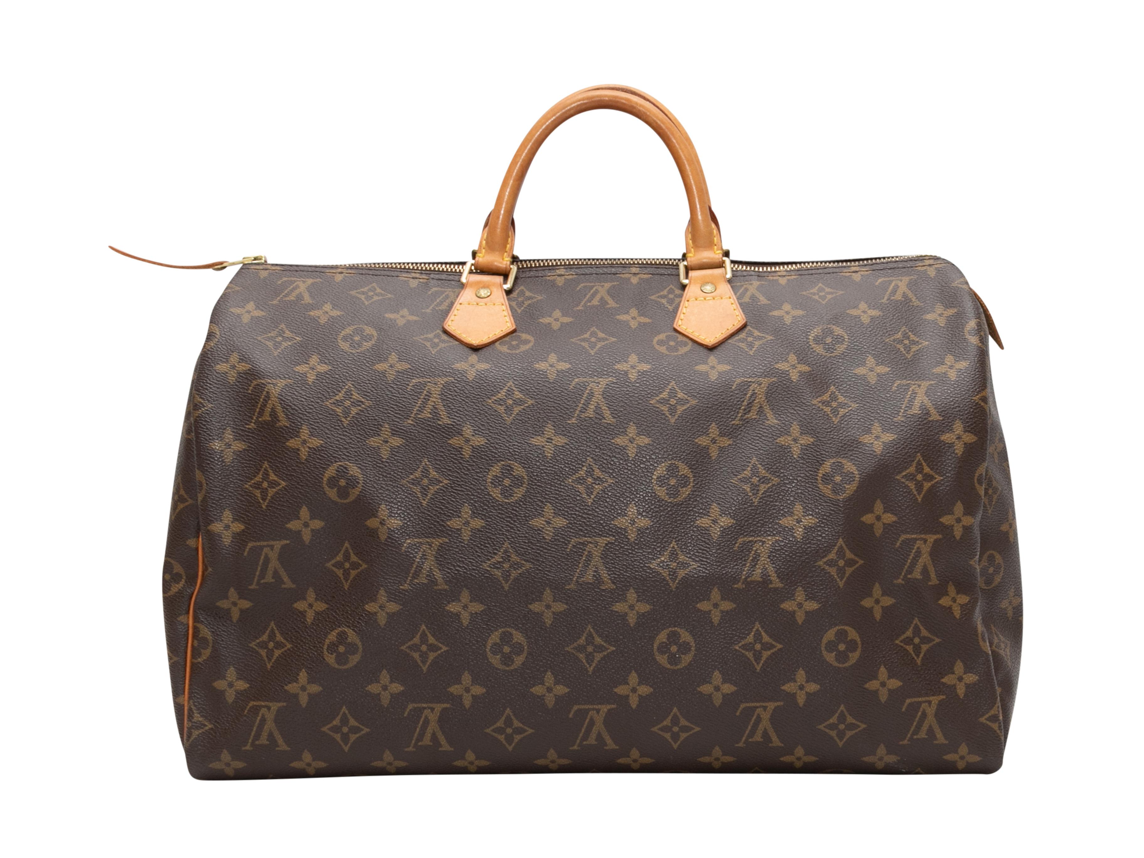 Brown Louis Vuitton Monogram Speedy 30. The Speedy 30 features a coated canvas body, leather trim, gold-tone hardware, dual rolled top handles, and a top zip closure. 15