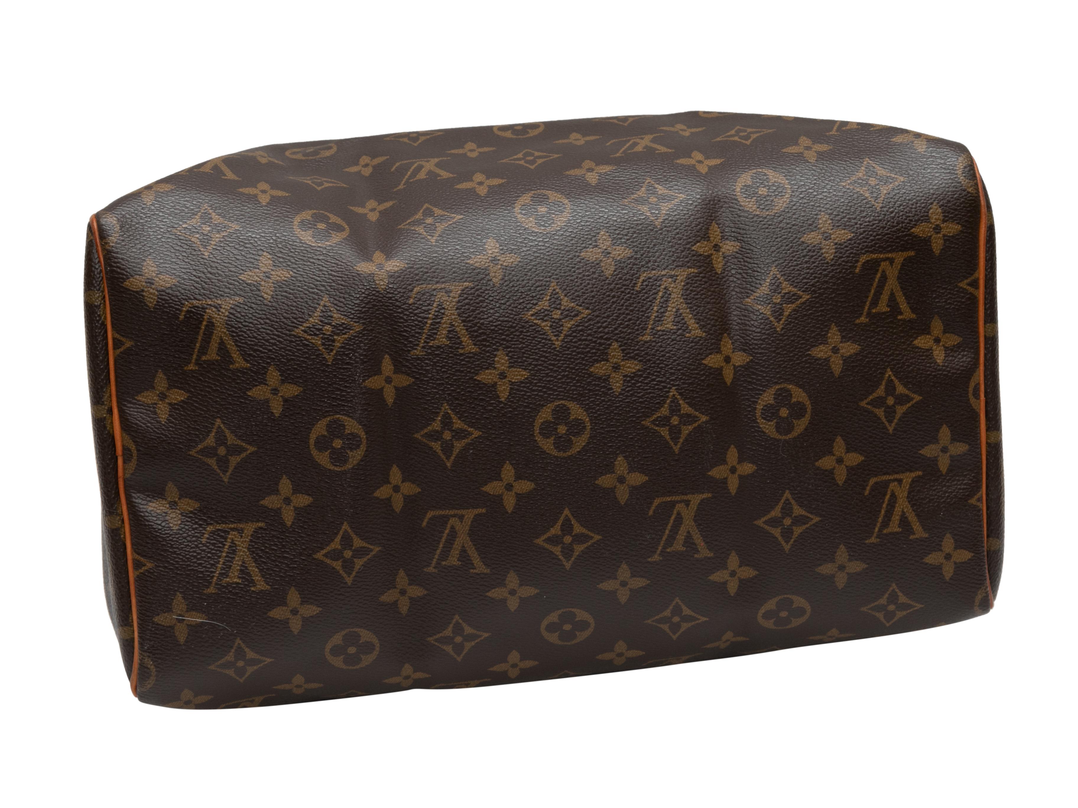 Brown Louis Vuitton Speedy 30 Handbag. The Speedy 30 features a monogram coated canvas body, leather trim, gold-tone hardware, dual rolled top handles, and a top zip closure. 12