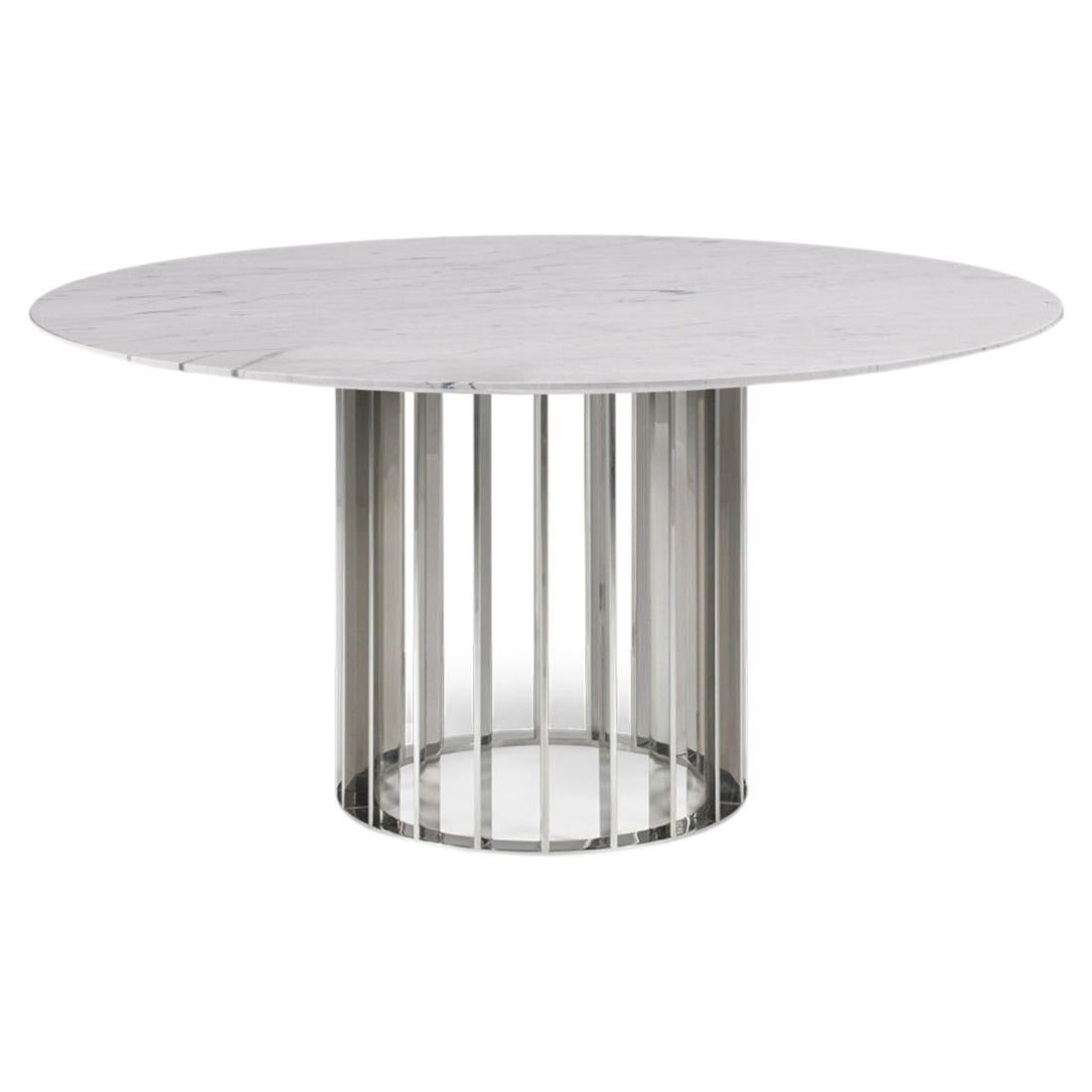 This unique dining table uses gorgeous Brown marble top and elegant and modern stainless steel base uses the repetition of metal stripes to bring rhythm to the base. Its design is simple but full of grace and WOW factor. 
The best craftsmanship was