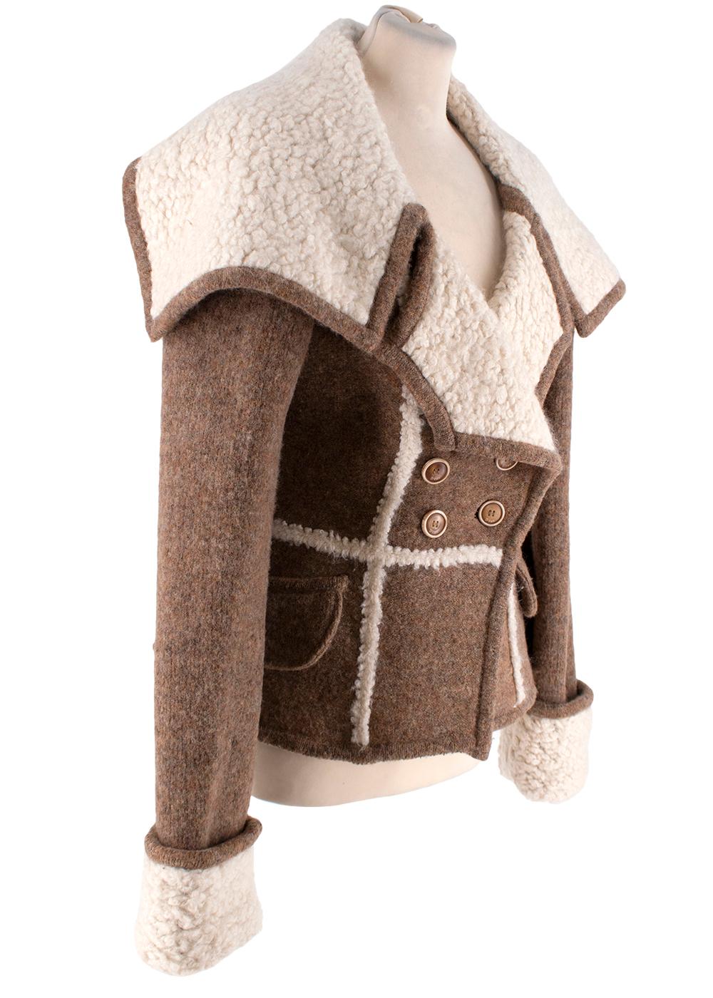 Dior Brown Marl Knitted Aviator Jacket

- Riff on the classic aviator jacket, crafted from brown marl wool-blend, with ivory textured boucle revere
- Double-breasted with 4 button fastening
- Wide, exaggerated lapels 
- Sharply tailored akin to the