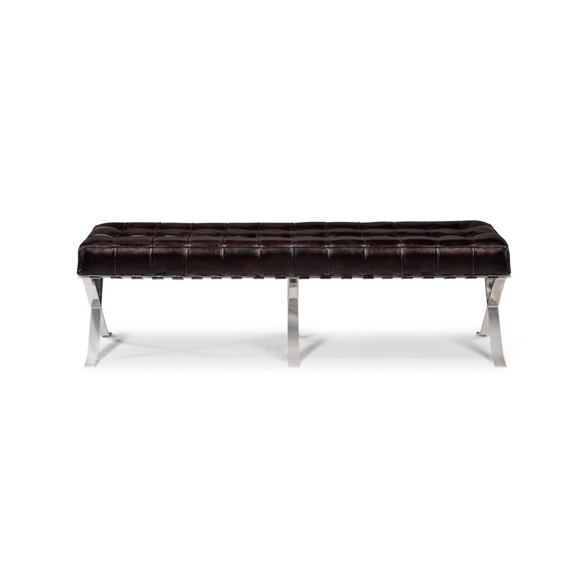 This sleek and modern bench combines luxury with a minimalist design, perfect for adding a touch of elegance to any interior space. The bench features a high-quality, deep brown tufted leather cushion that exudes comfort and sophistication. The