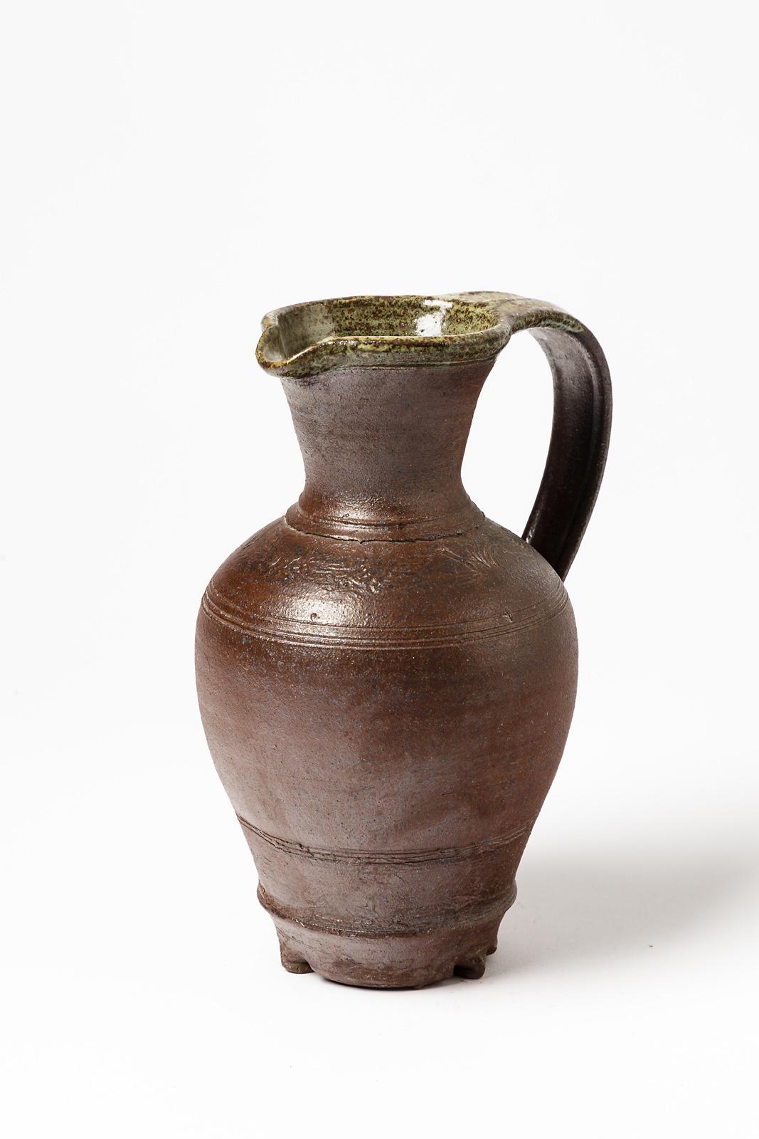 Rouillard

Unique handmade mid XXth century ceramic pitcher

Original brown stoneware ceramic color

Signed under the base

Original perfect condition

Measures: Height 21 cm Large 15 cm.