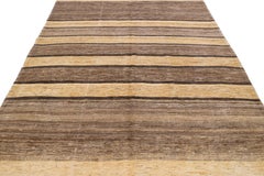 Alfombra de lana persa Shouli Gabbeh marrón moderna hecha a mano con diseño de rayas