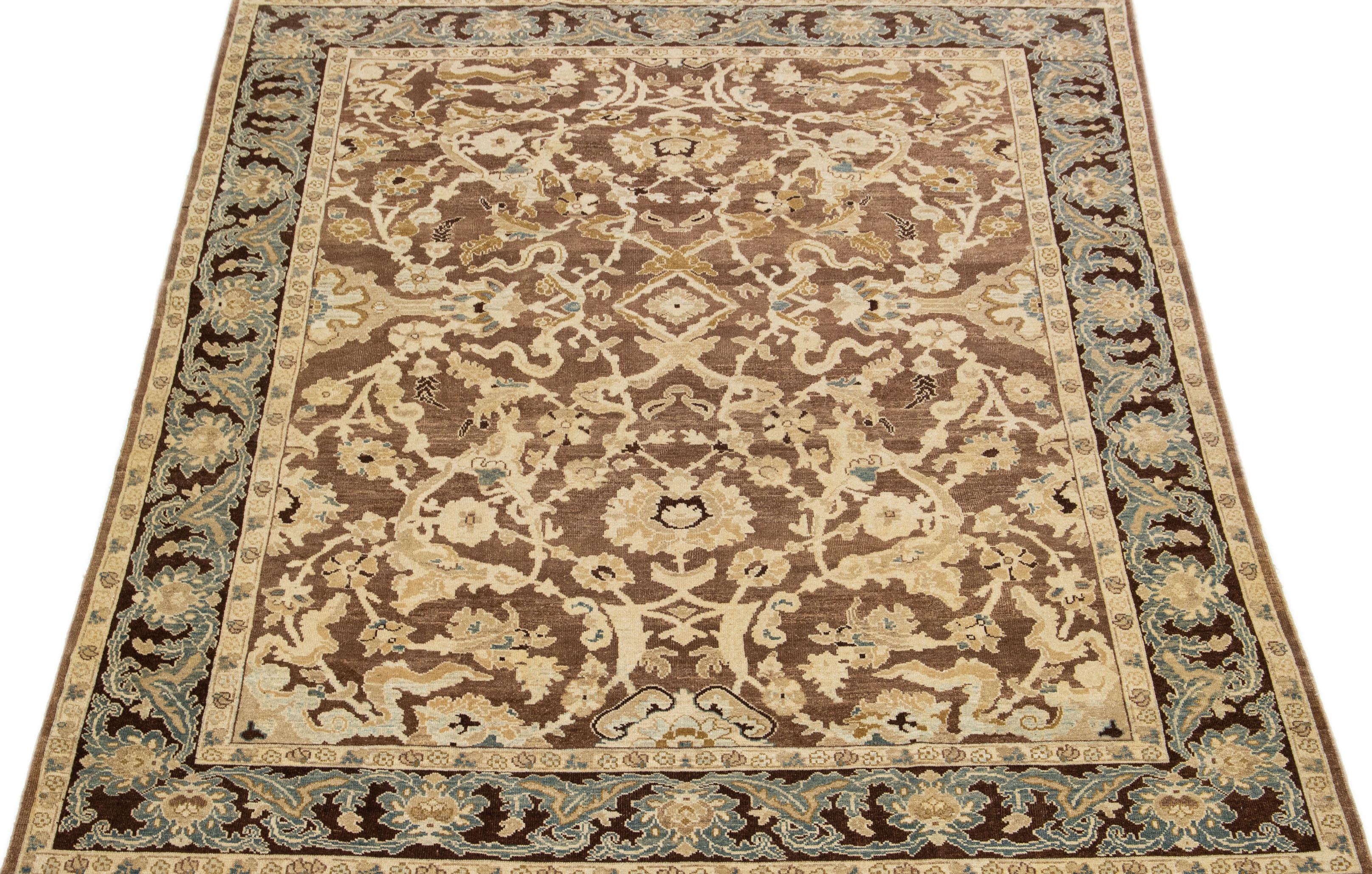 Beautiful modern room-size Sultanabad hand-knotted wool rug with a brown color field. This rug has a designed frame with beige and blue accents in a gorgeous all-over floral motif.

This rug measures 8' x 10'.

Our rugs are professional cleaning