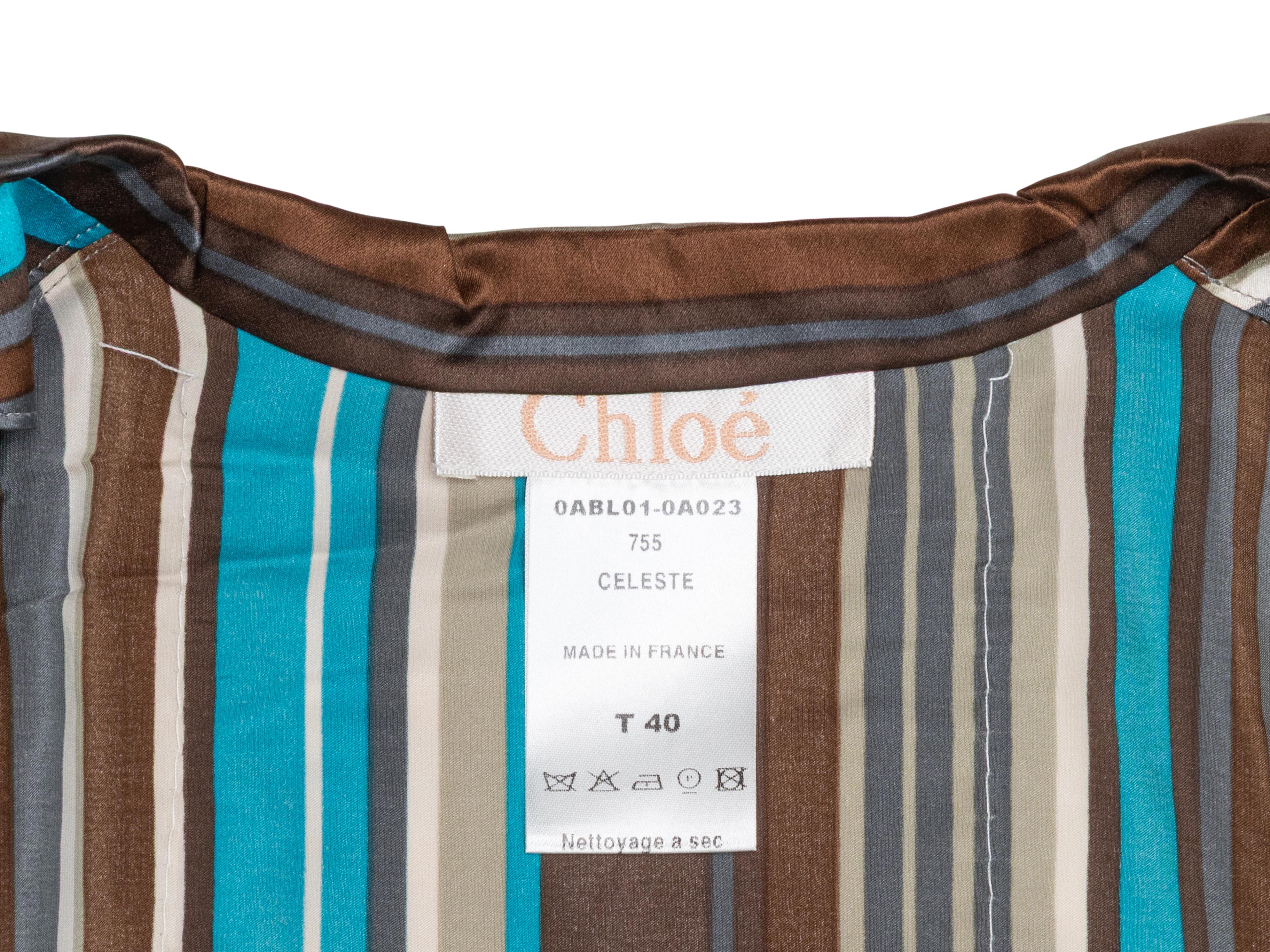 Brown, white, and turquoise silk striped button-up top by Chloe. Sequin embellishments. Pointed collar. Button closures at center front. 36