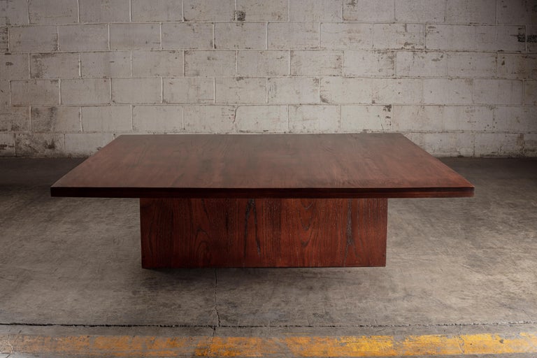 Brown oak square coffee table.