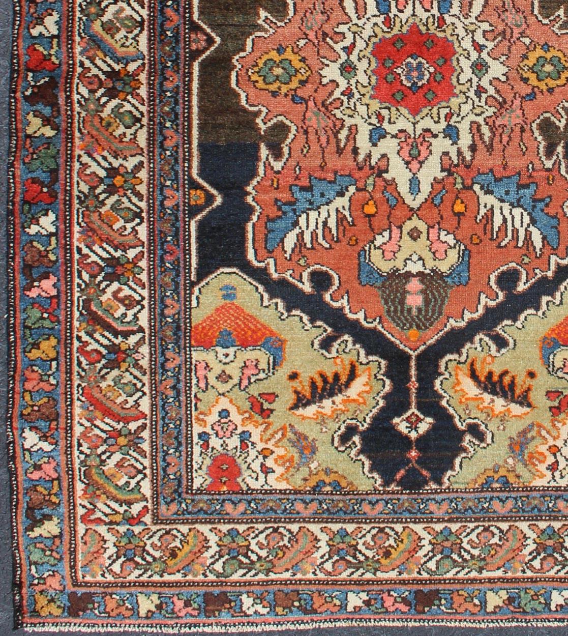 Antique Malayer rug from Persia with medallion and decorated cornices, rug 19-0403, country of origin / type: Iran / Malayer, circa 1910

This beautiful antique Malayer rug from Persia features a unique medallion design, the central field is framed