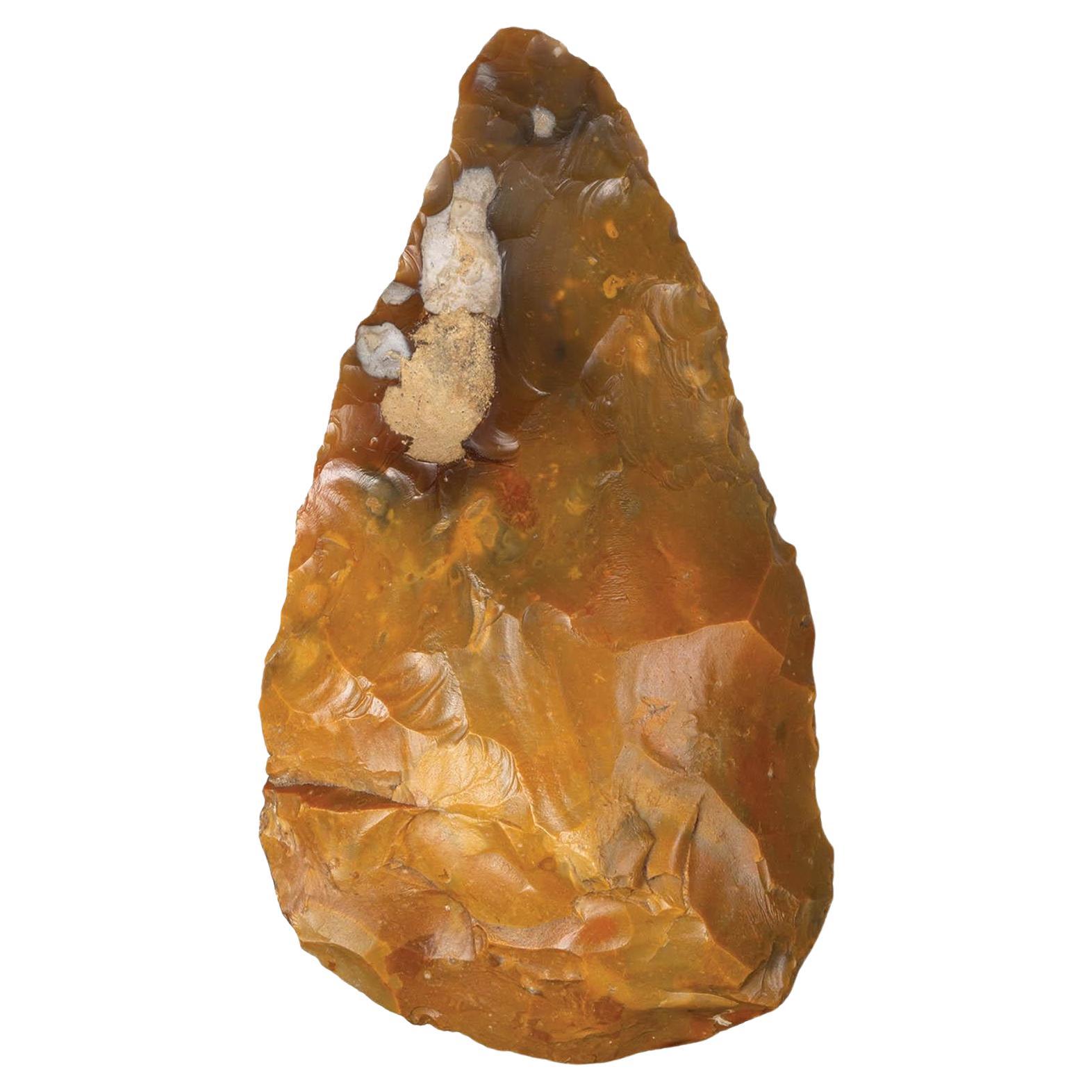 Brown-Orange Hand Axe made by Early Humans For Sale