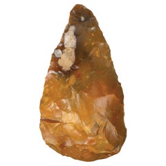 Brown-Orange Hand Axe made by Early Humans