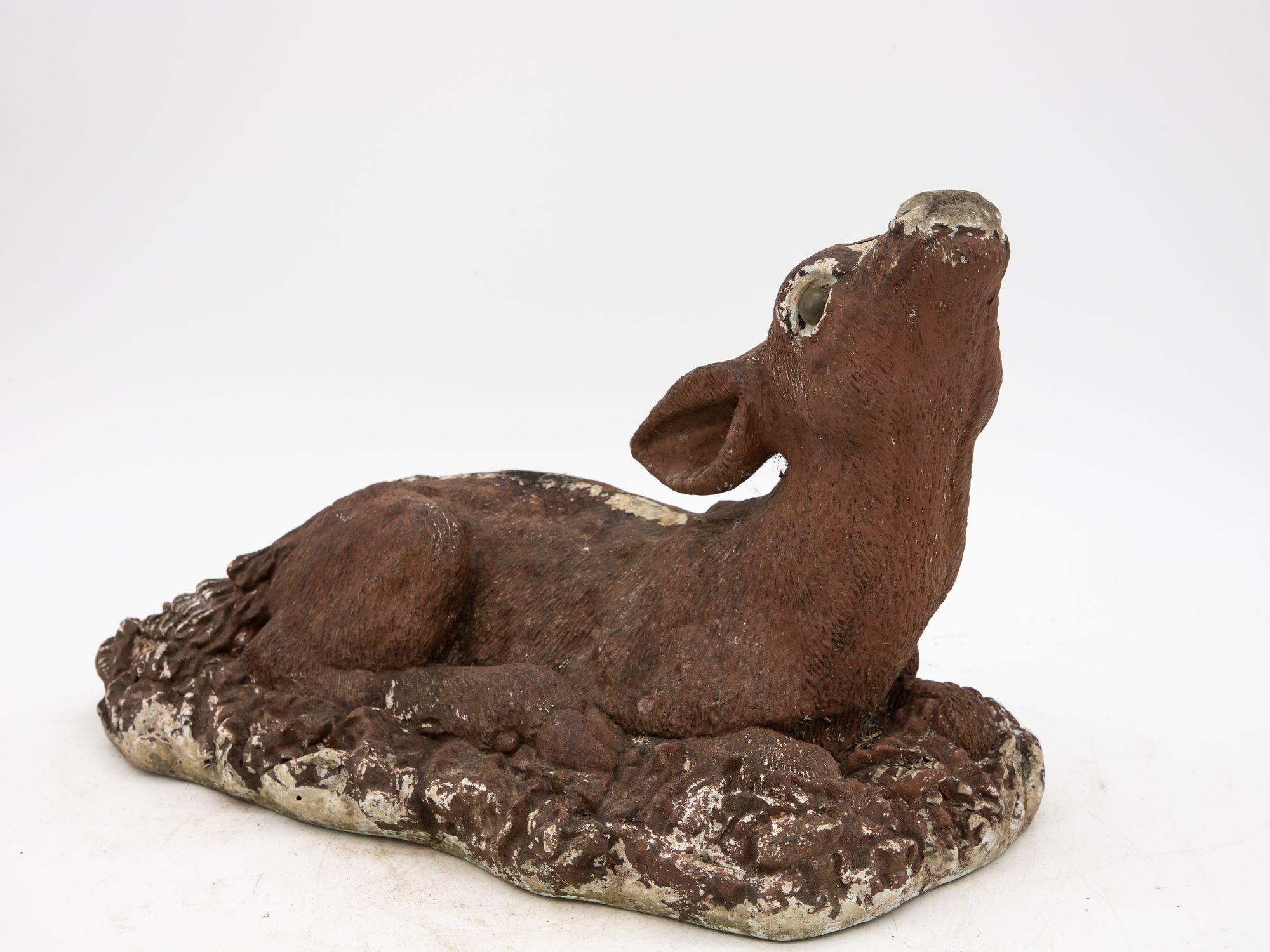 Transport yourself to the enchanting gardens of the mid-20th century with this exquisite French garden ornament in the shape of a fawn, doe or deer. Crafted with meticulous attention to detail and recreating a lifelike coat, this captivating